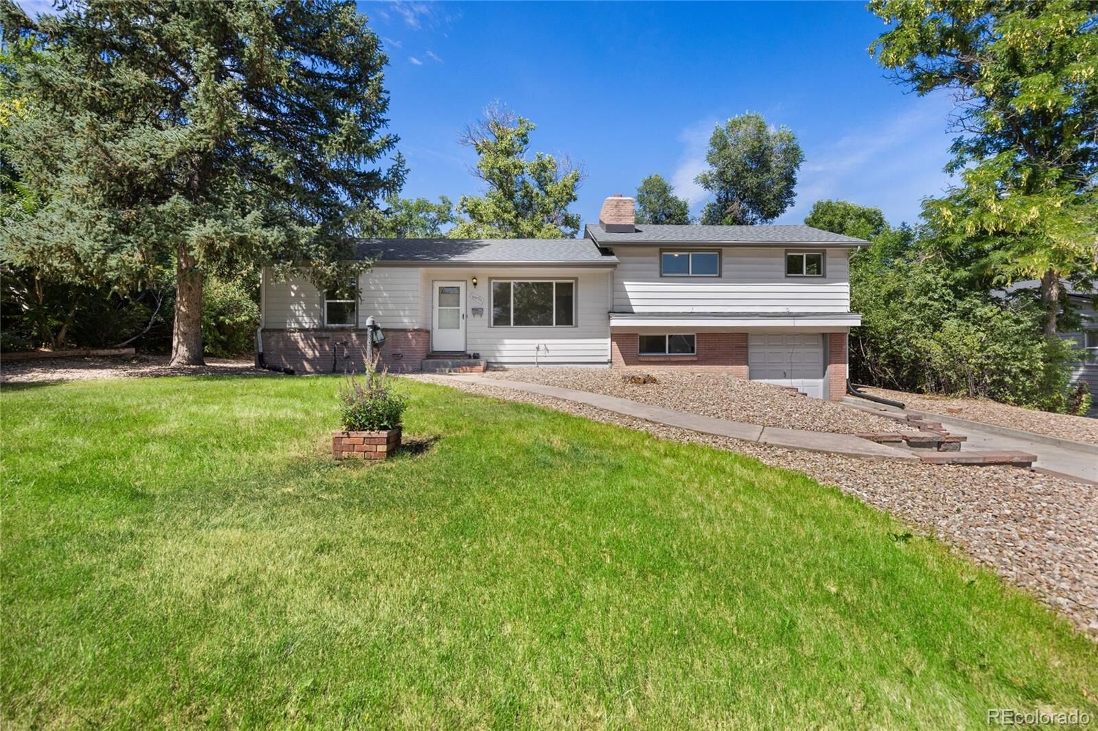 Property Photo:  6631 S Cedar Street  CO 80120 
