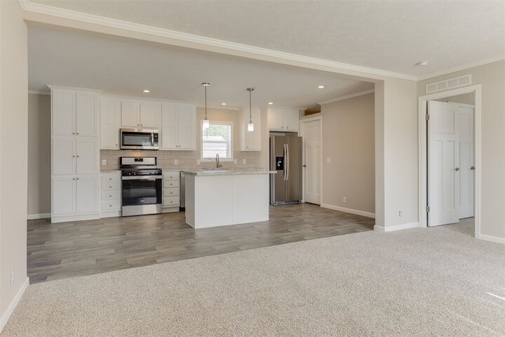 Property Photo: 539 Harwood Court 134 MI 48827