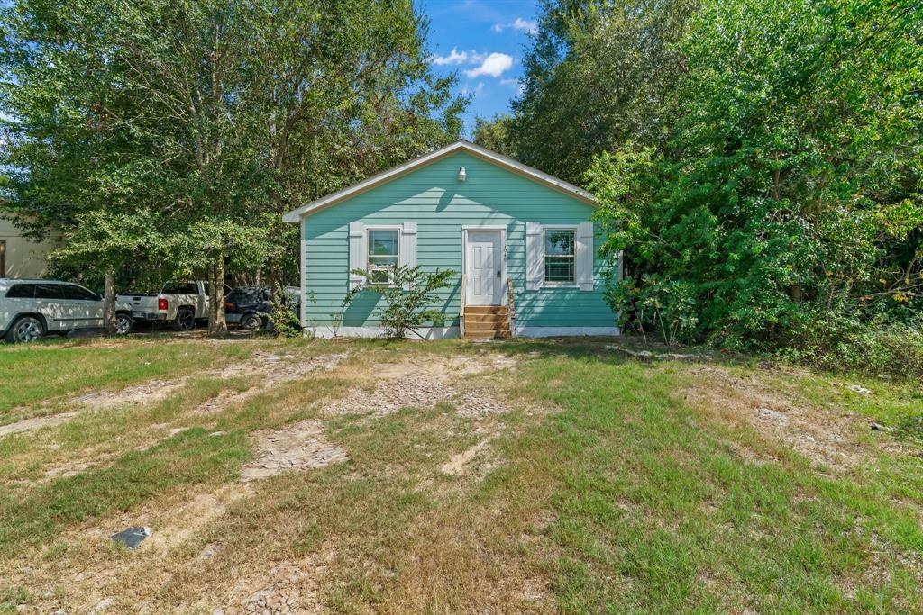 Property Photo:  1040 Road 5007  TX 77327 