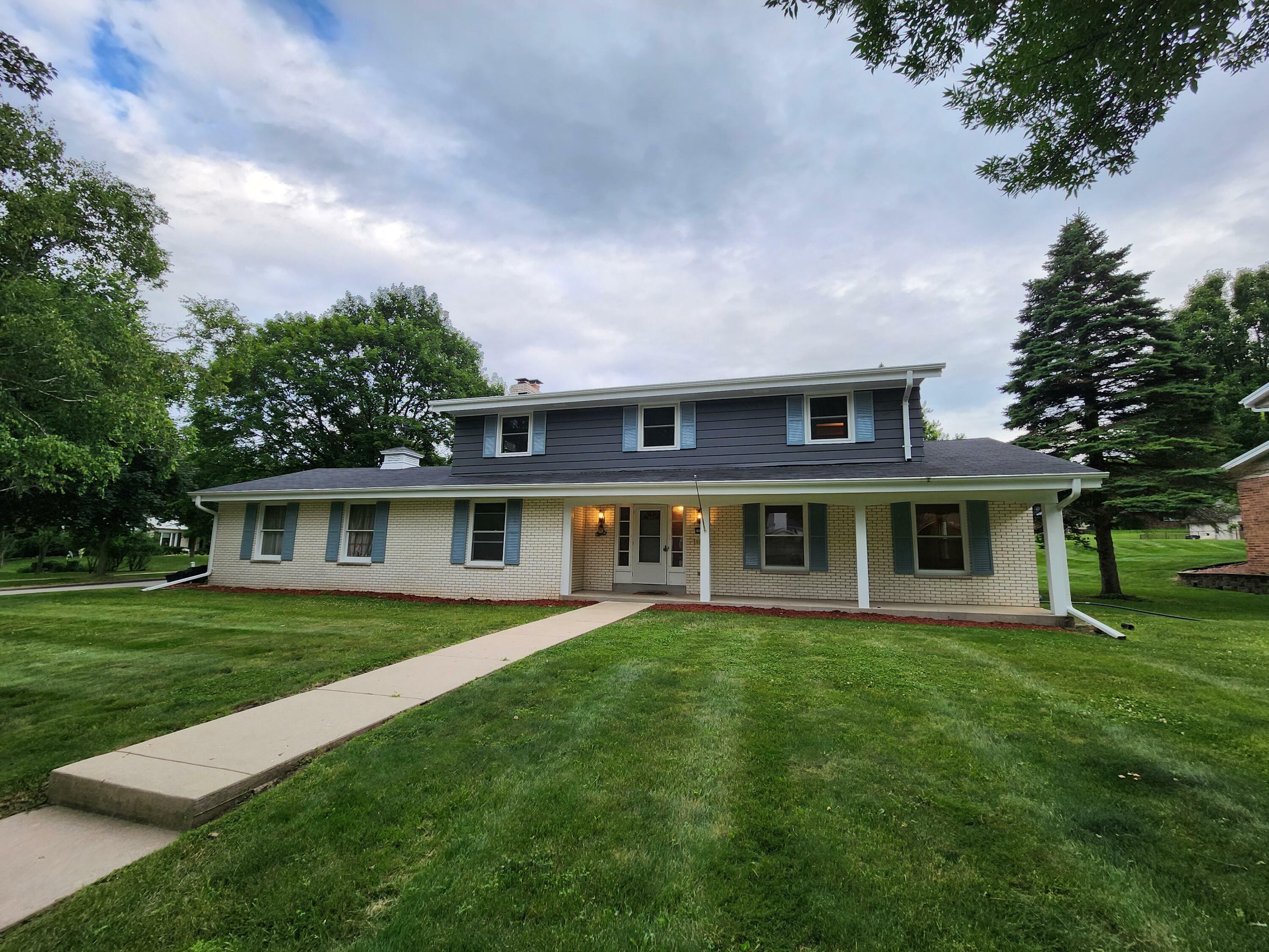 Property Photo:  12209 W Holt Ave  WI 53227 