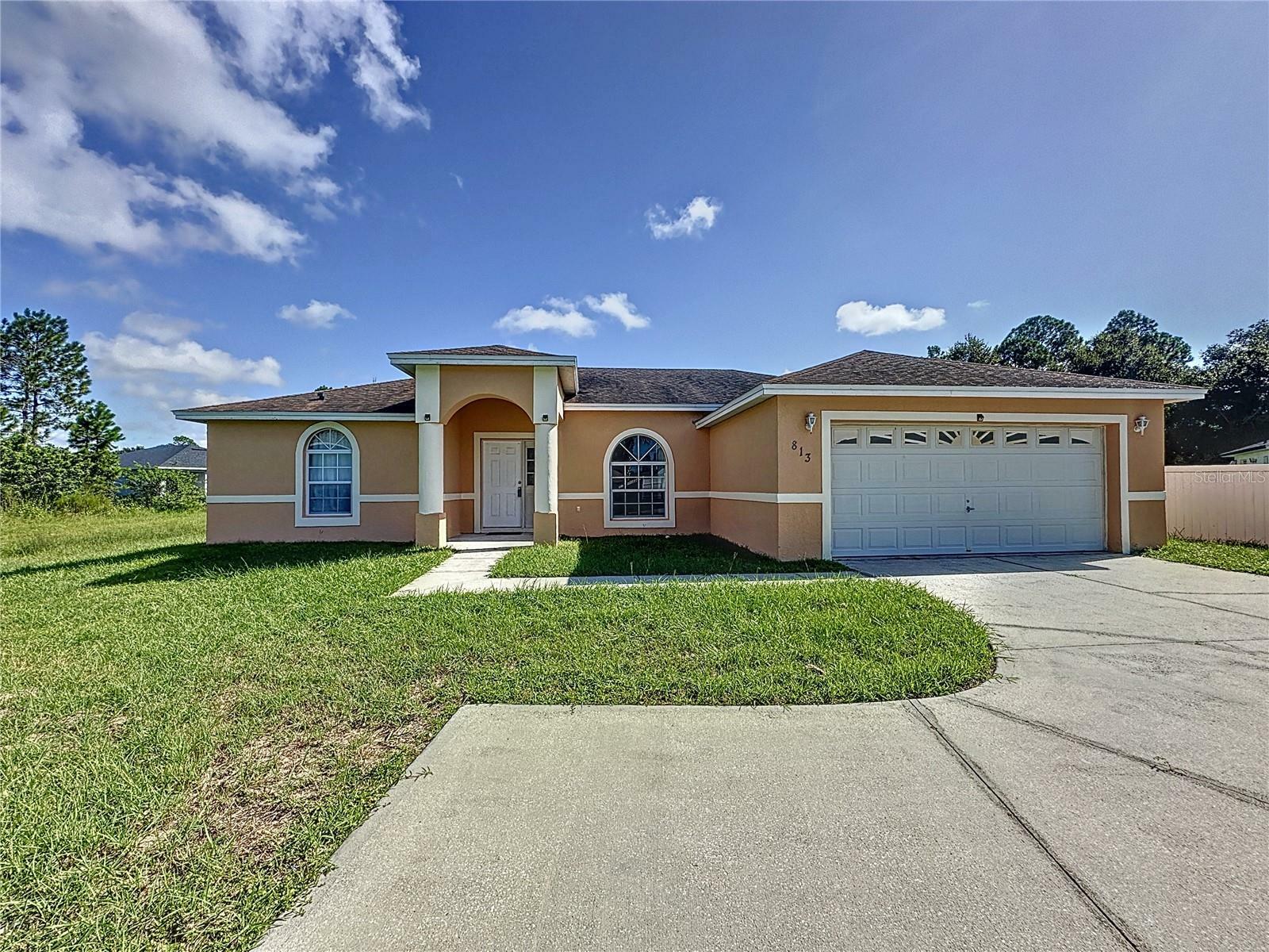 Property Photo:  813 Hastin Place  FL 34758 