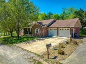 Property Photo:  303 W Robin Trail  AR 72644 