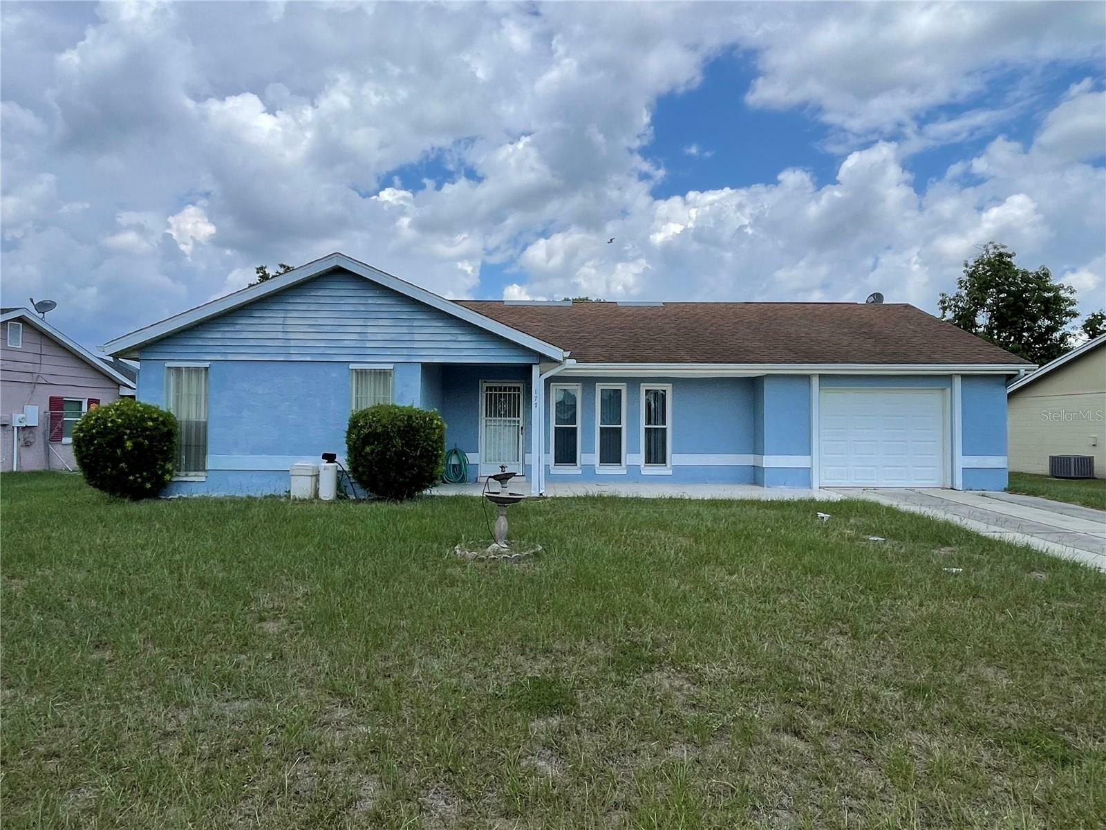 Property Photo:  177 E Cedarwood Circle  FL 34743 