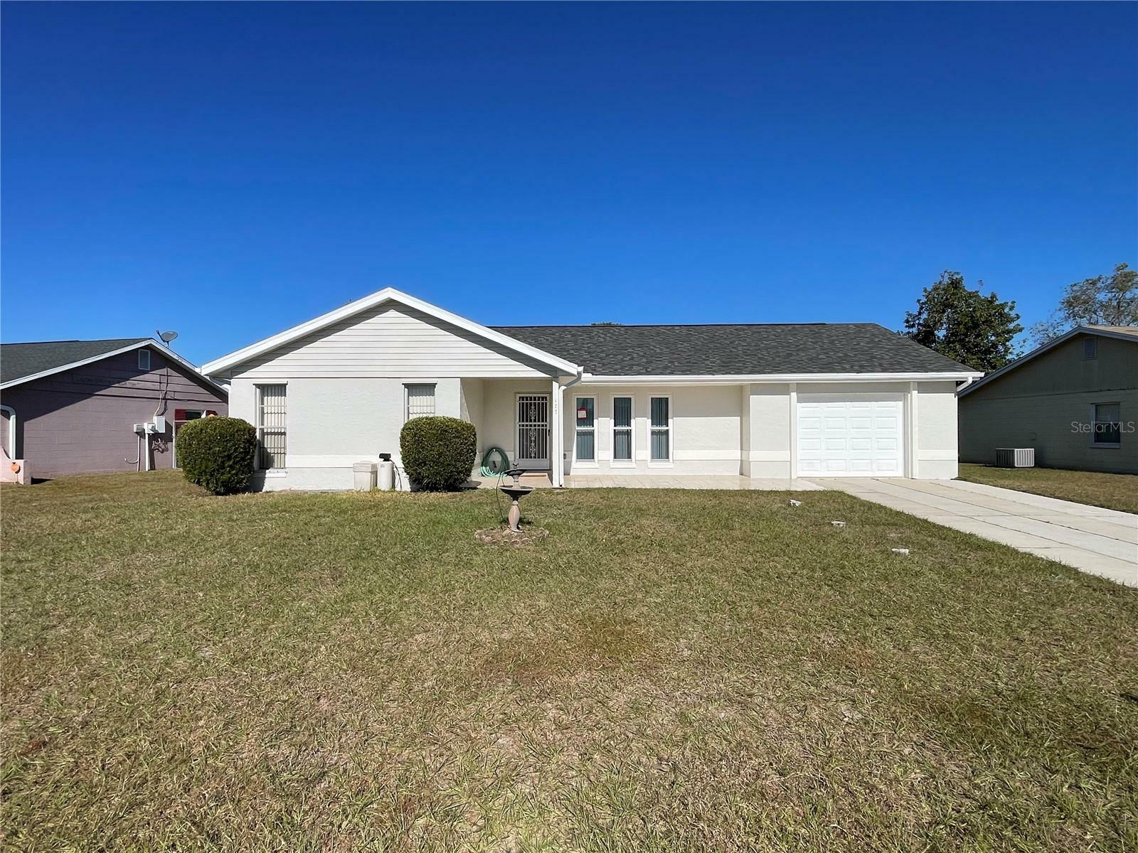 Property Photo:  177 E Cedarwood Circle  FL 34743 