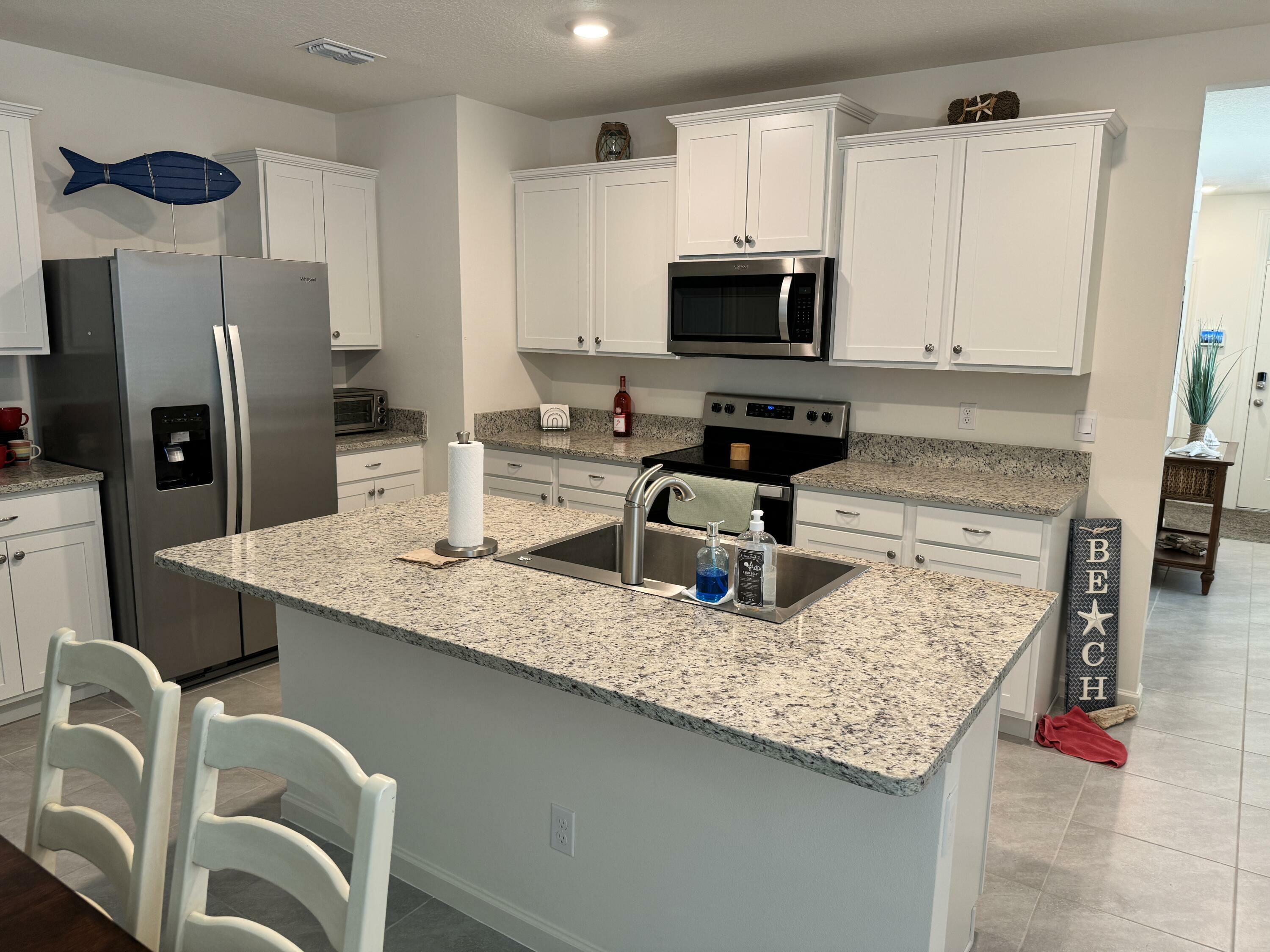 Property Photo:  12170 SW Rimini Way  FL 34987 