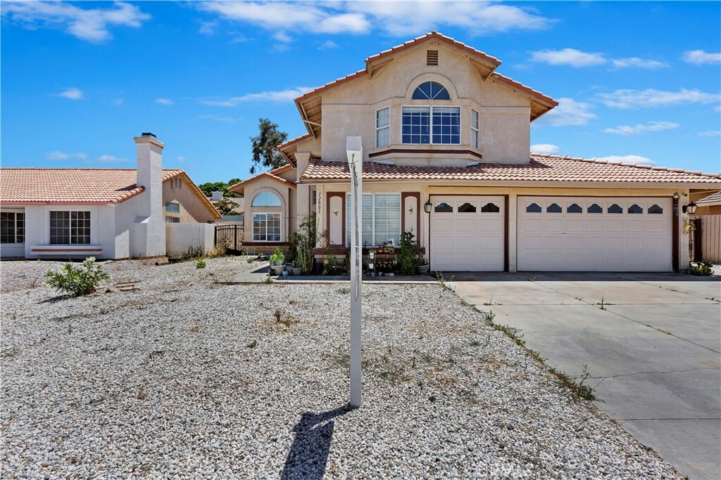 Property Photo:  12803 Cardinal Road  CA 92392 