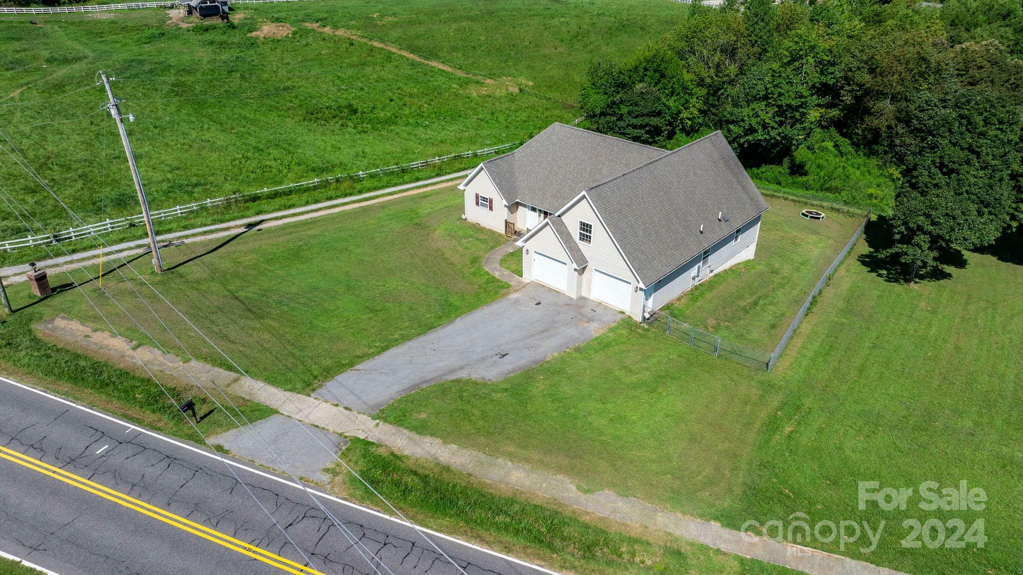 Property Photo:  1678 Jamestown Road  NC 28655 