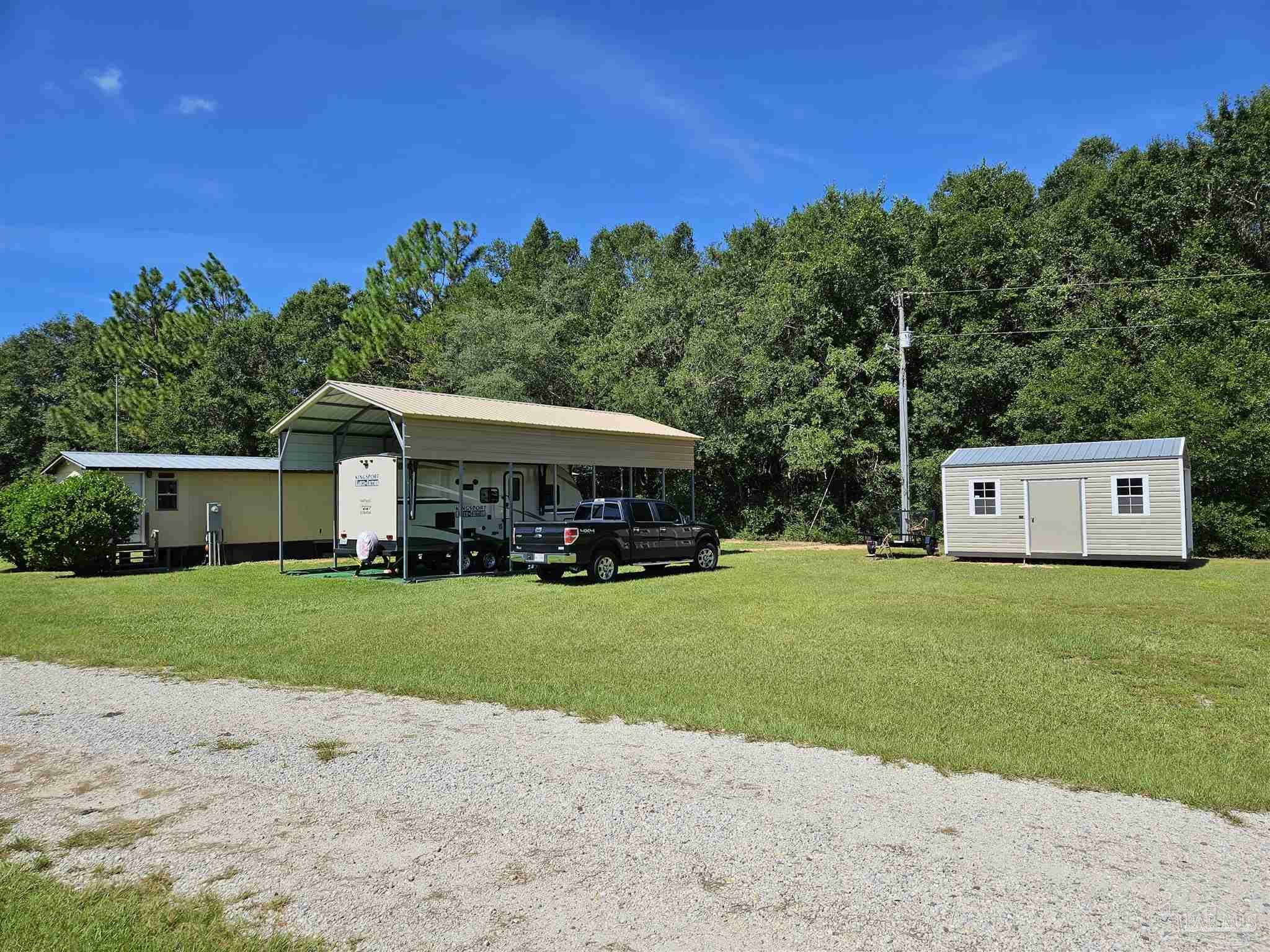 Property Photo:  5697 Hollow Pine Ct  FL 32583 