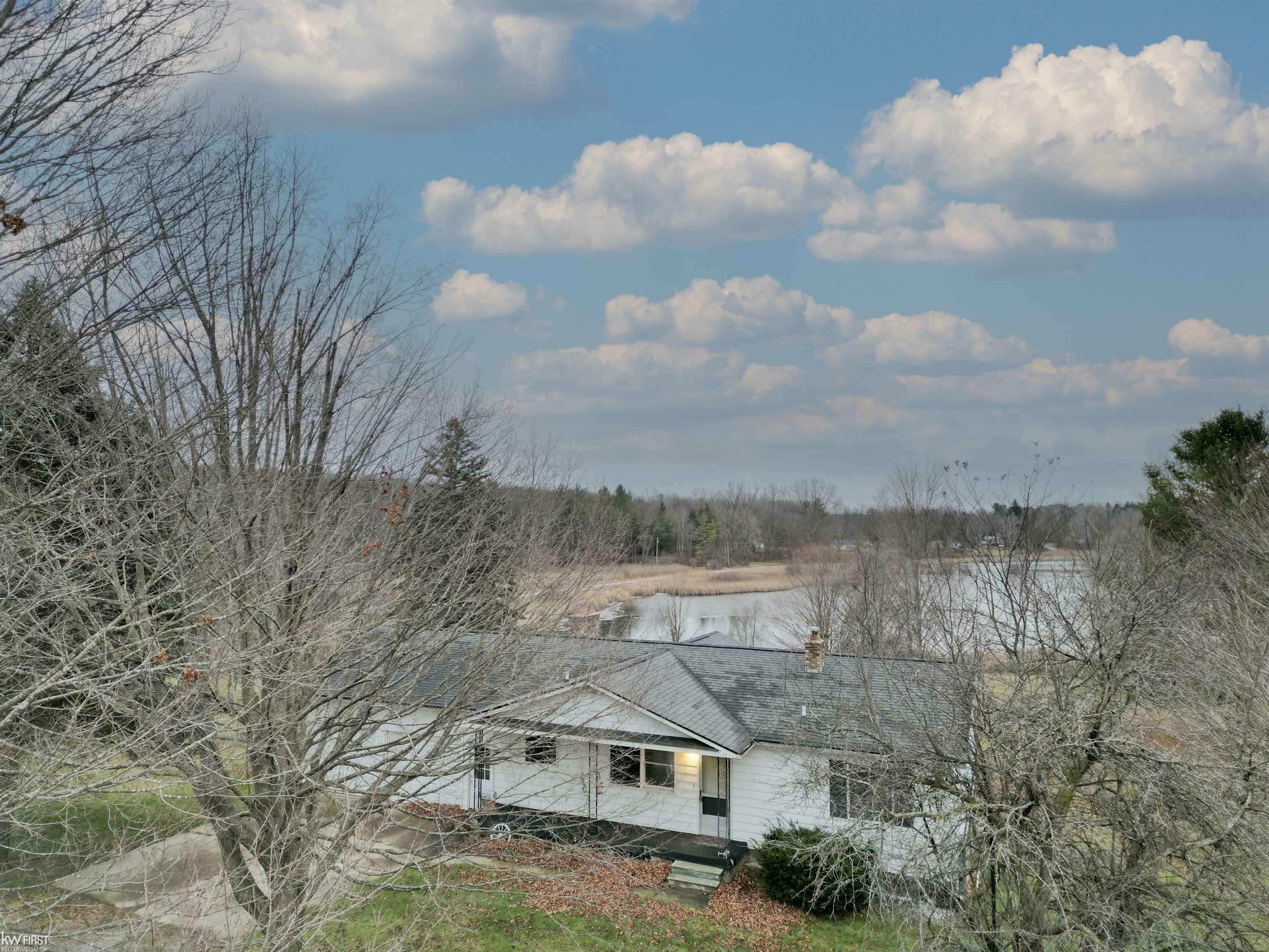 Property Photo:  444 Cemetery Road  MI 48463 