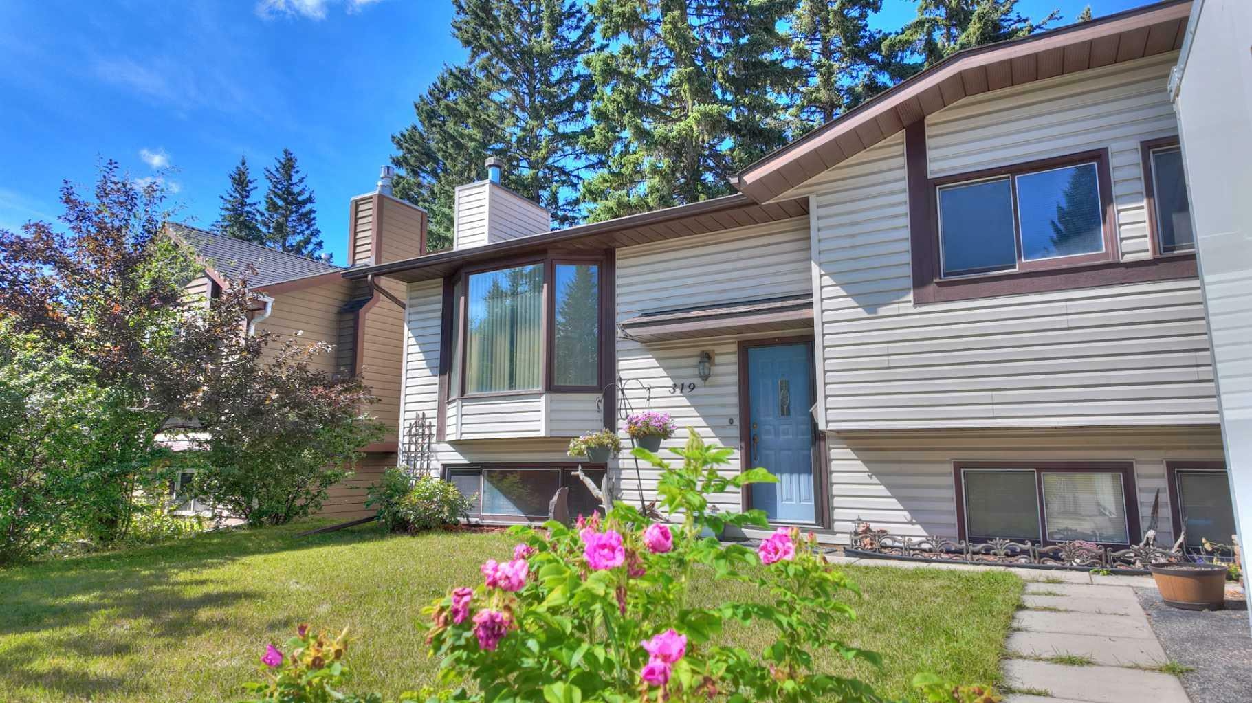 Property Photo:  319 Silvertip Close  AB T1W 1B6 