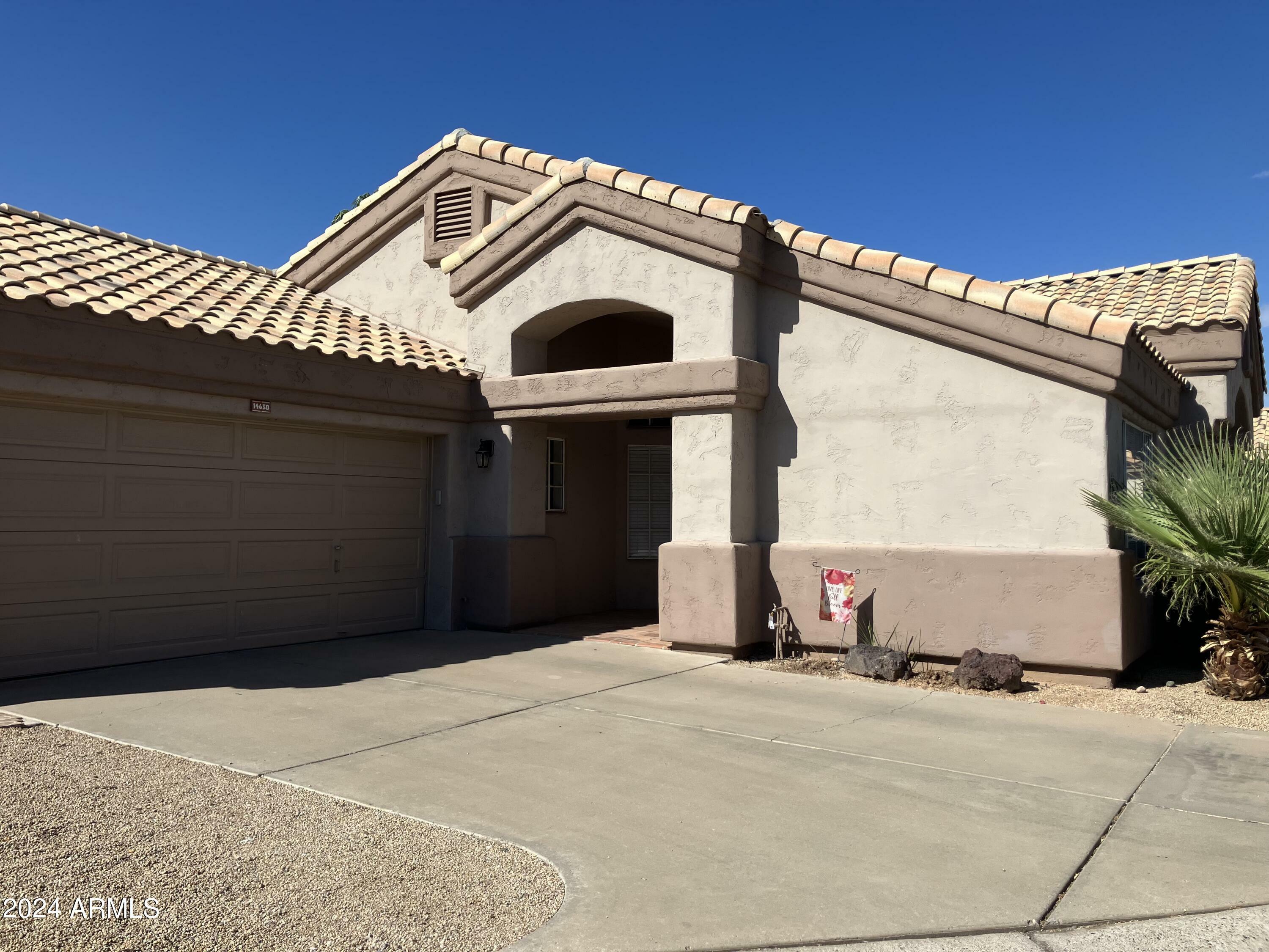 Property Photo:  14638 W Raindance Road  AZ 85374 