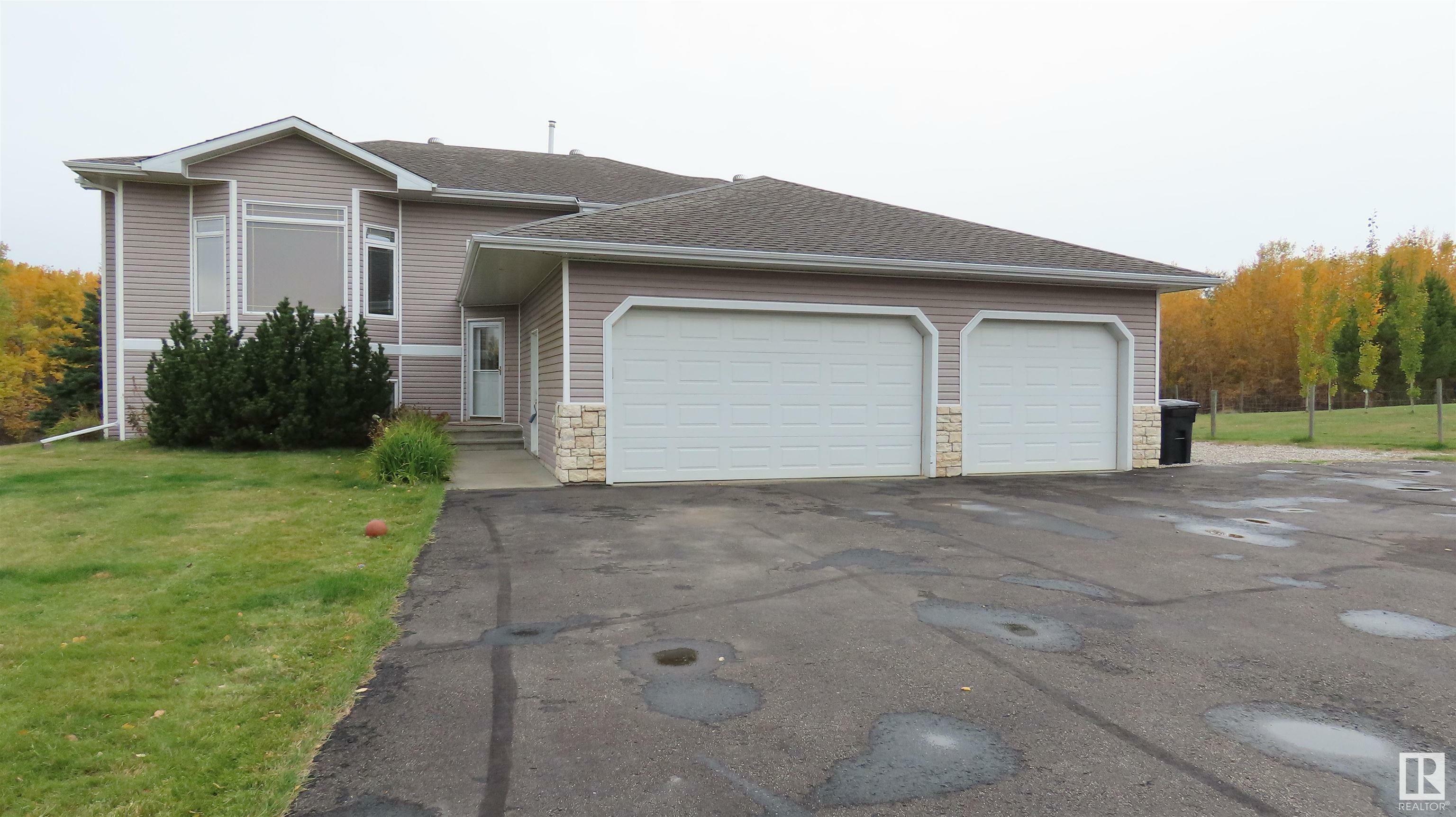 Property Photo:  53424 Rge Rd 14  AB T7Y 0B5 