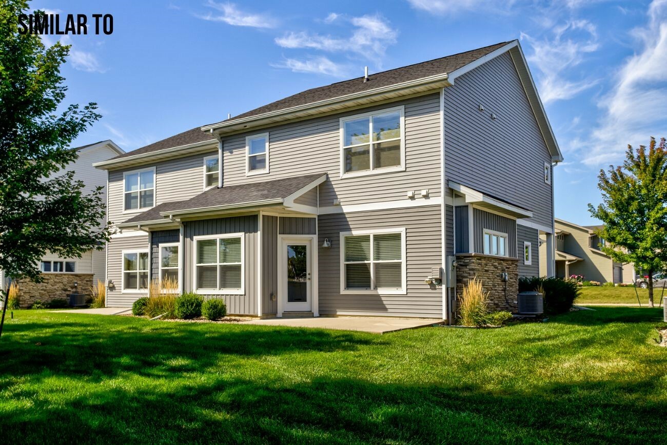 Property Photo:  308 Larson Drive  IA 50124 