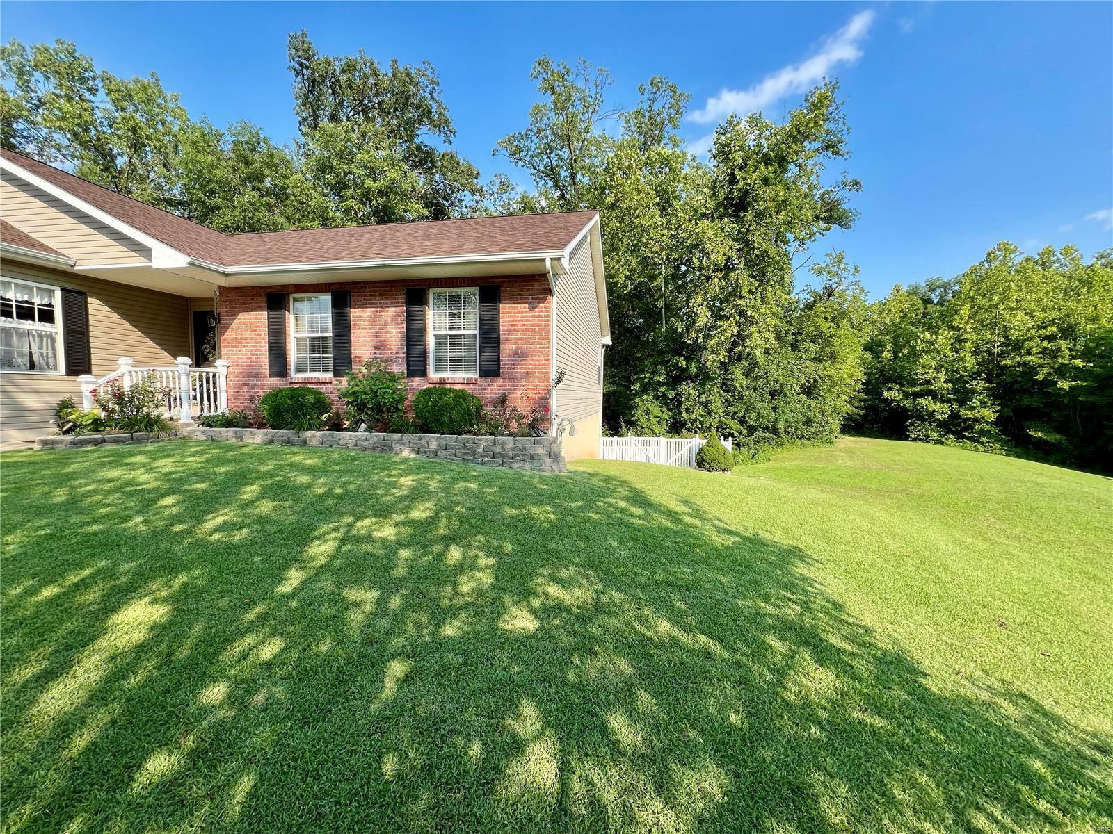 Property Photo:  219 Williamsburg Drive  MO 63019 