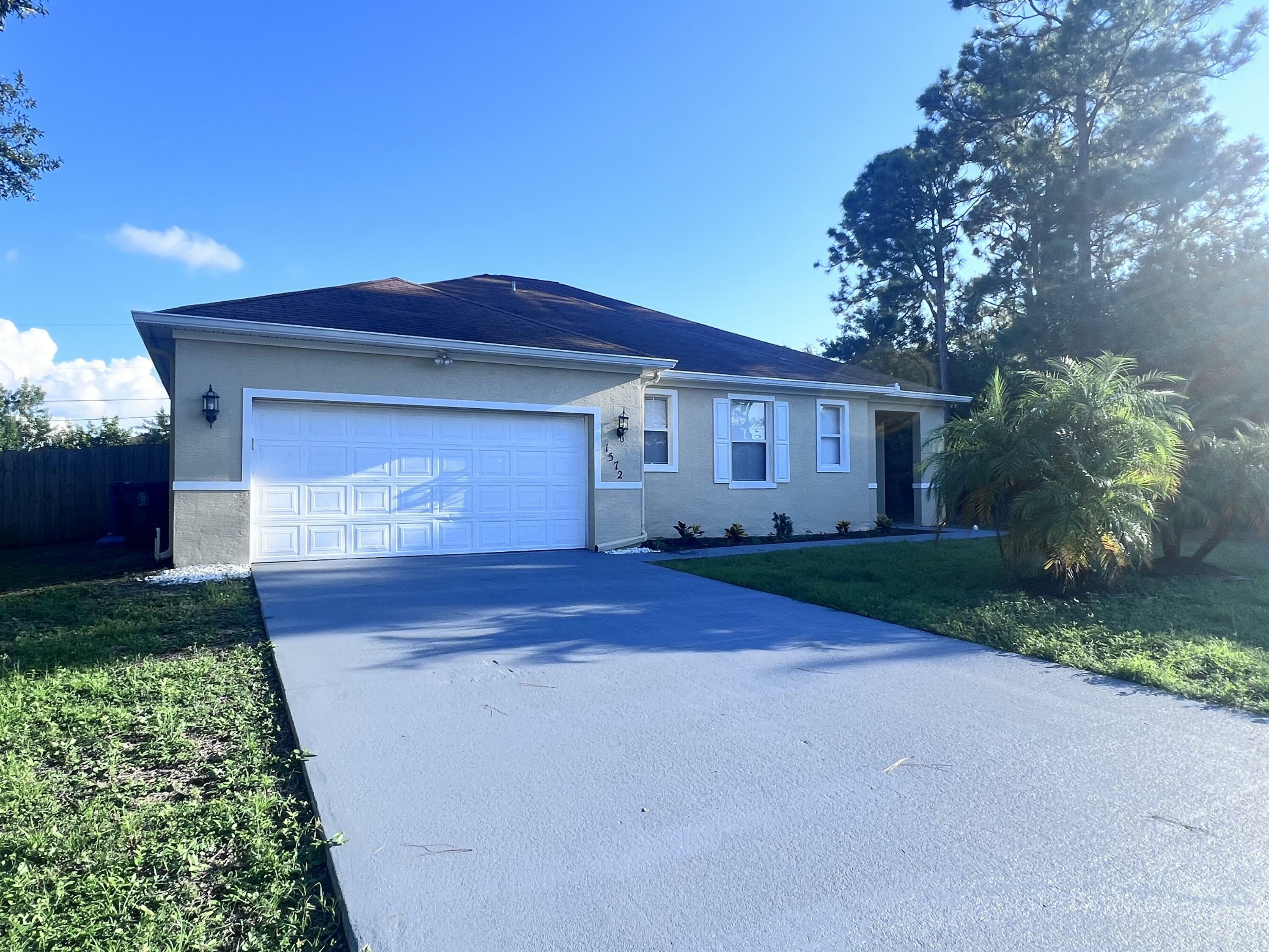 Property Photo:  1897 SW Lofgren Avenue  FL 34953 