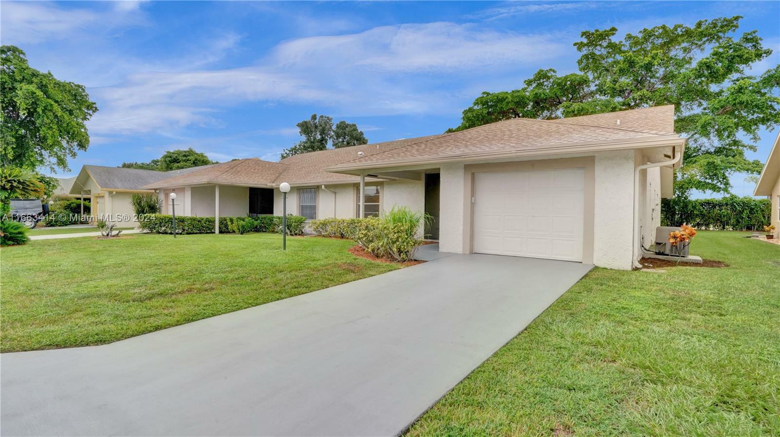 Property Photo:  5372 Crystal Anne Dr  FL 33417 