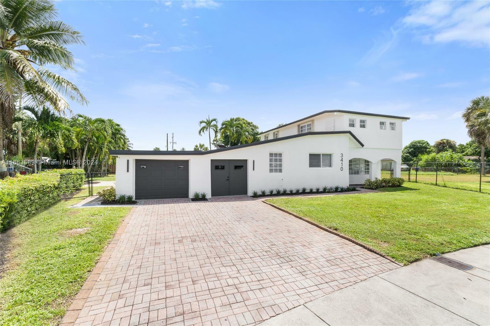 Property Photo:  3410 NW 8th Ct  FL 33311 