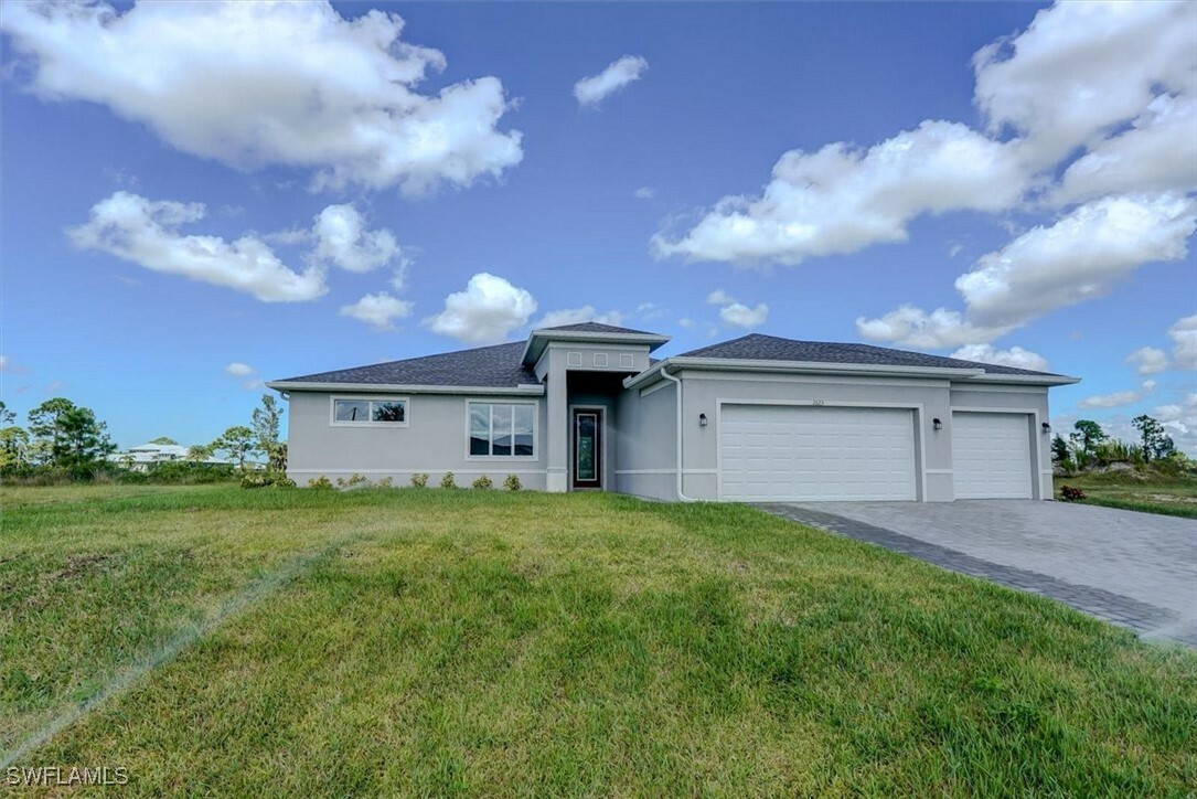 Property Photo:  2623 NW 25th Street  FL 33993 