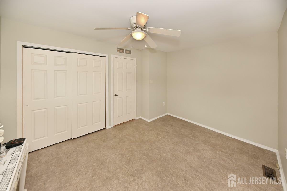 Property Photo:  2-C John Tyler Court  NJ 08831 