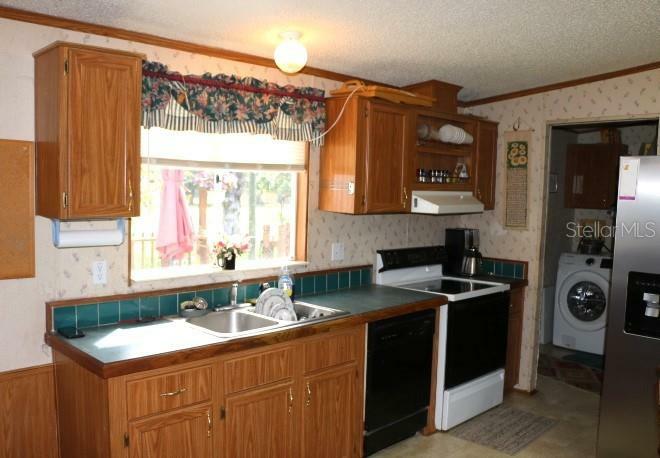 Property Photo:  4873 Cr 772  FL 33597 