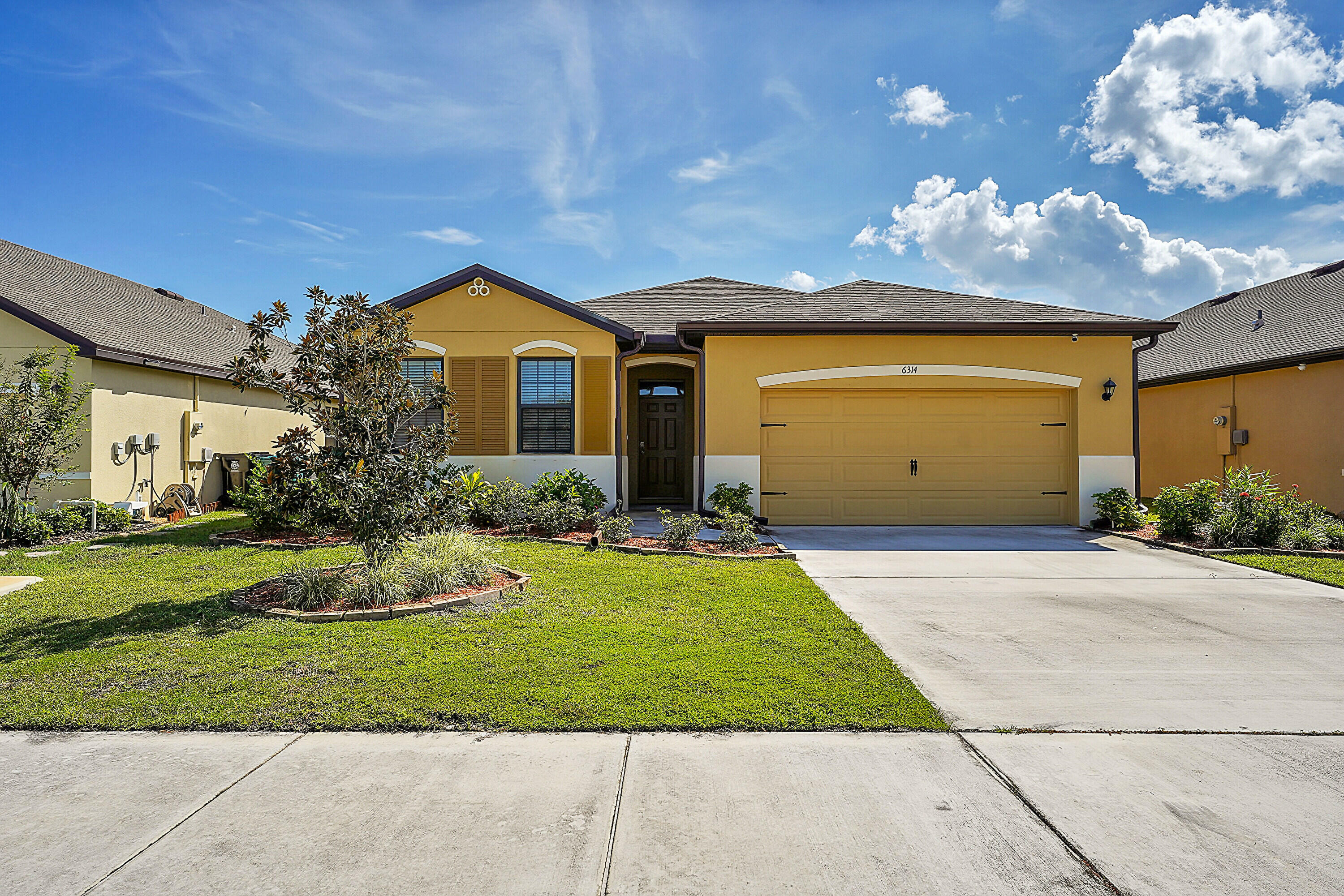 Property Photo:  6314 NW Northwood Loop  FL 34983 