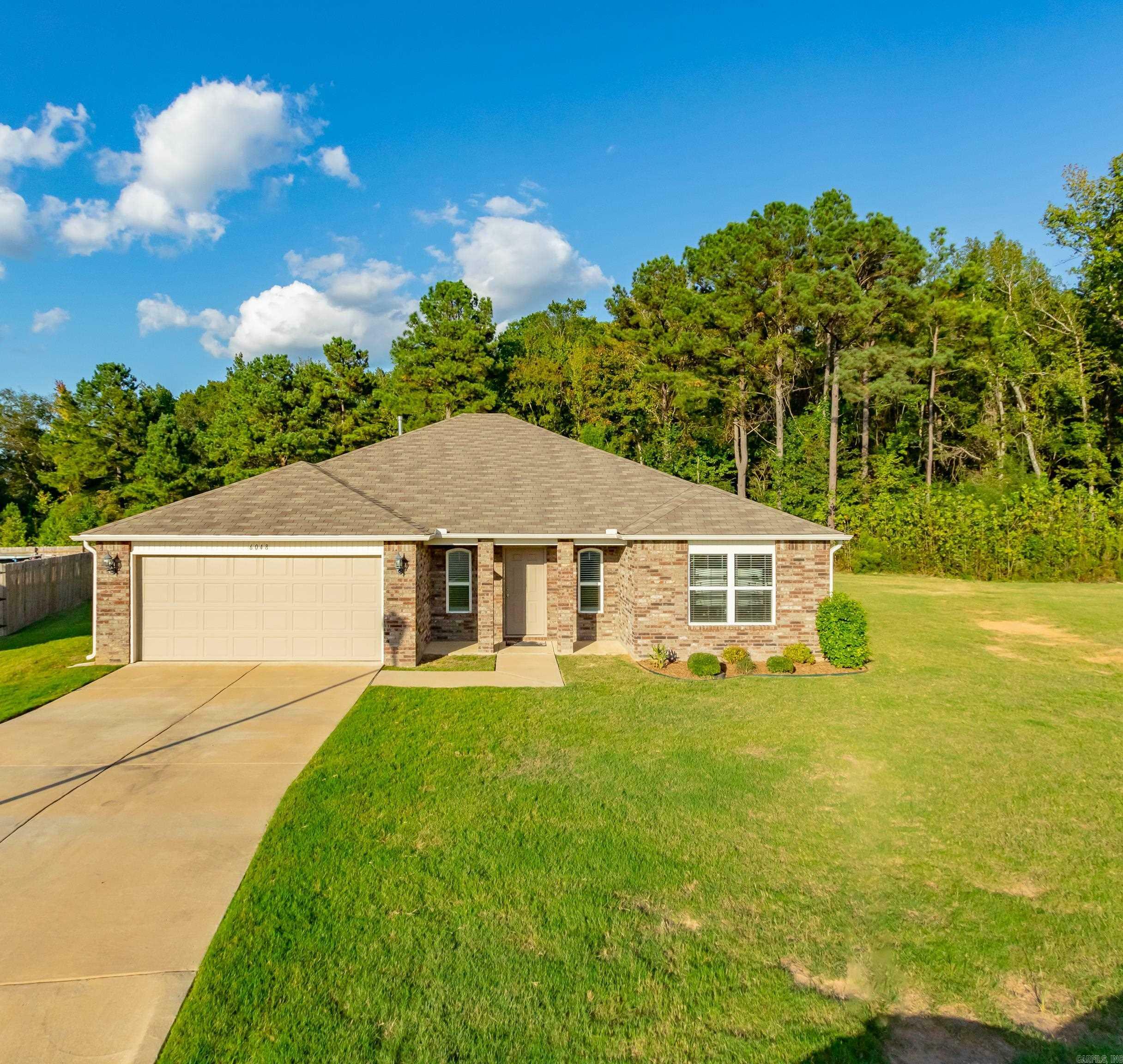 Property Photo:  6048 Woodcreek Cove  AR 72002 