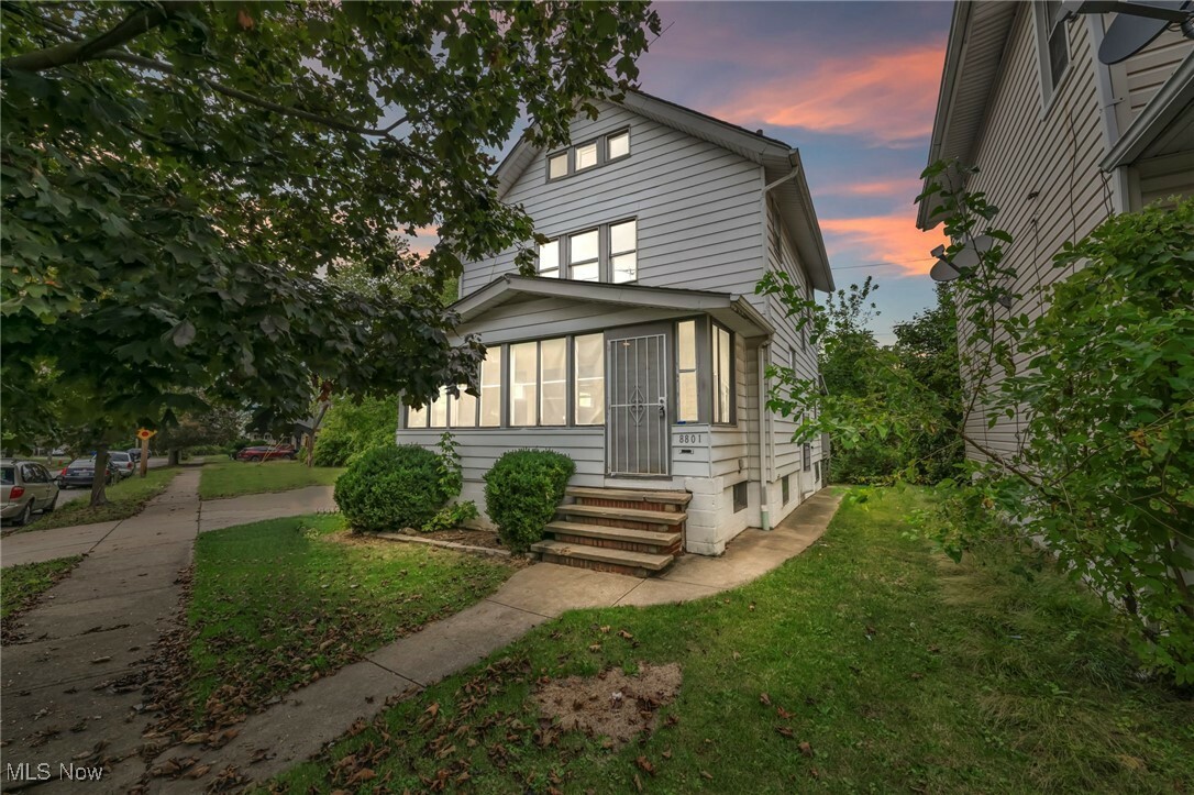 Property Photo:  8801 Macomb Avenue  OH 44105 