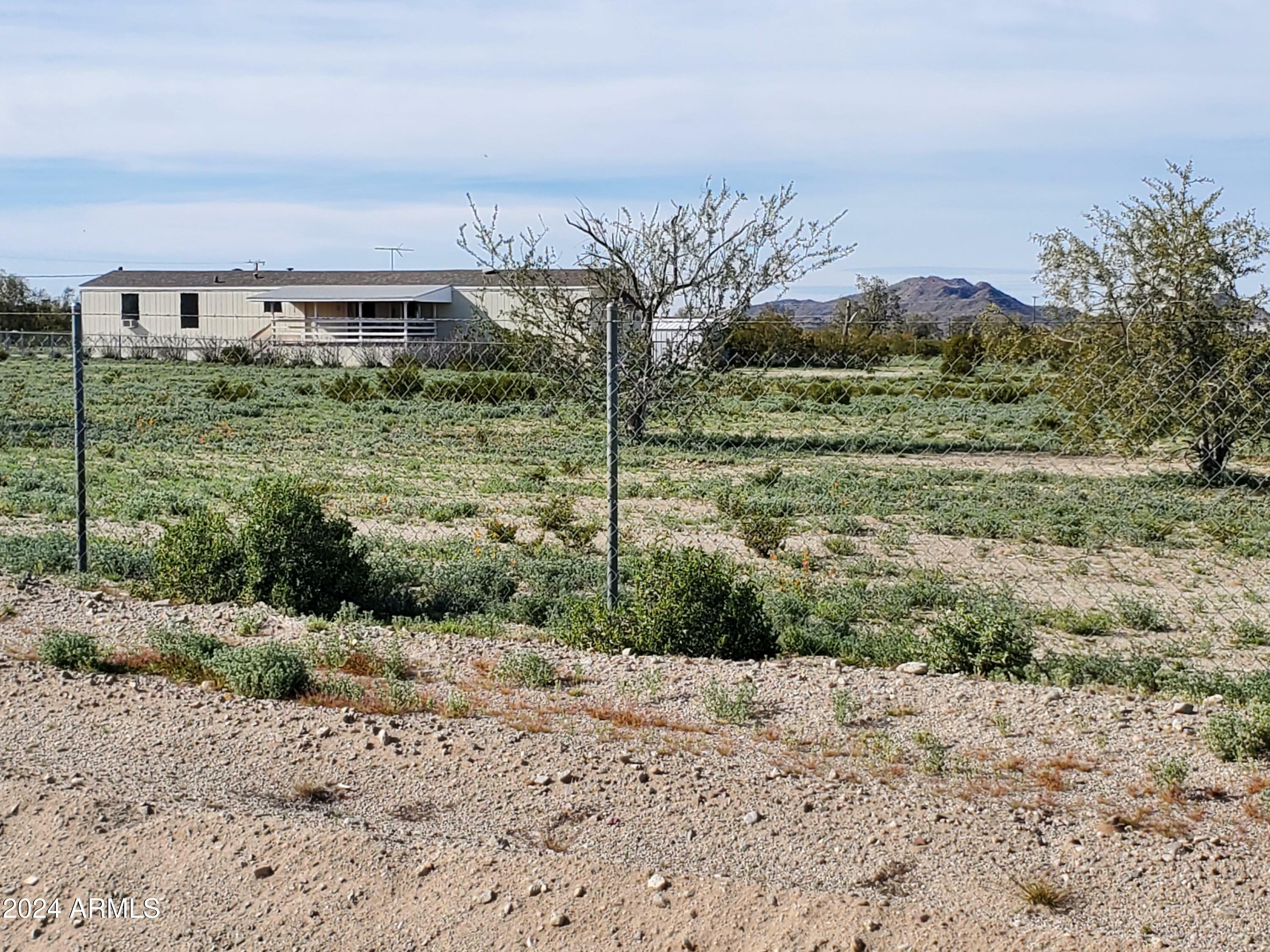 Property Photo:  53974 W Barrel Road  AZ 85139 