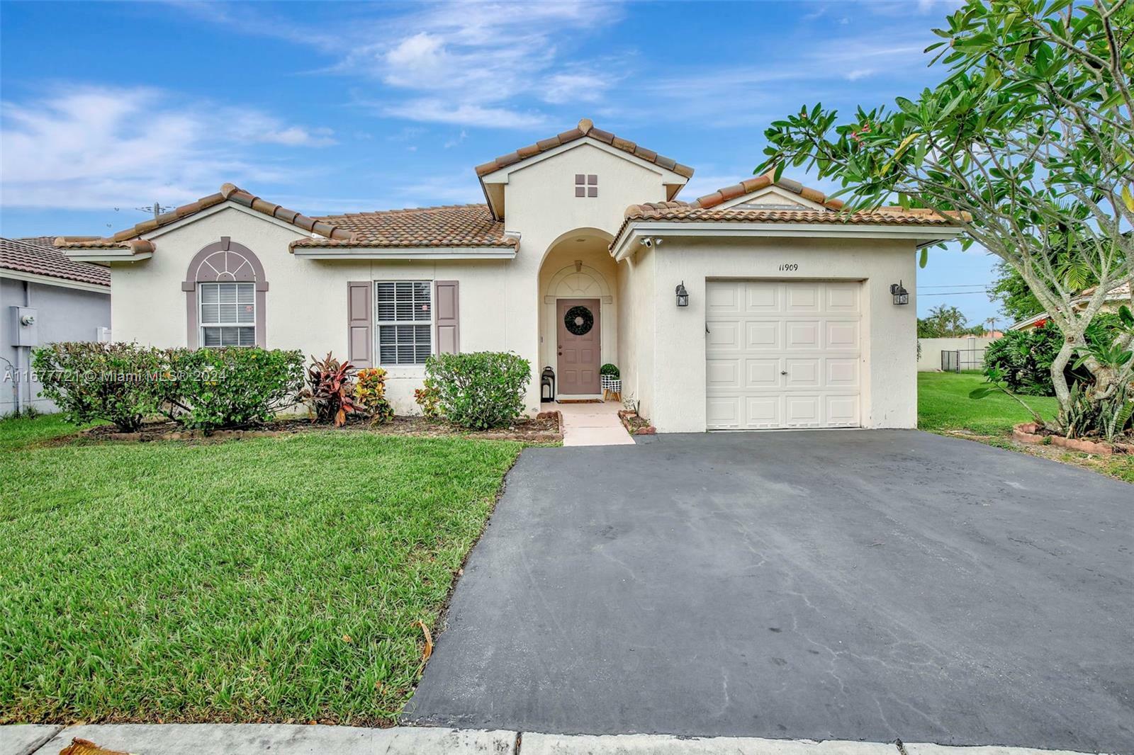 Property Photo:  11909 SW 17th  Ct  FL 33025 