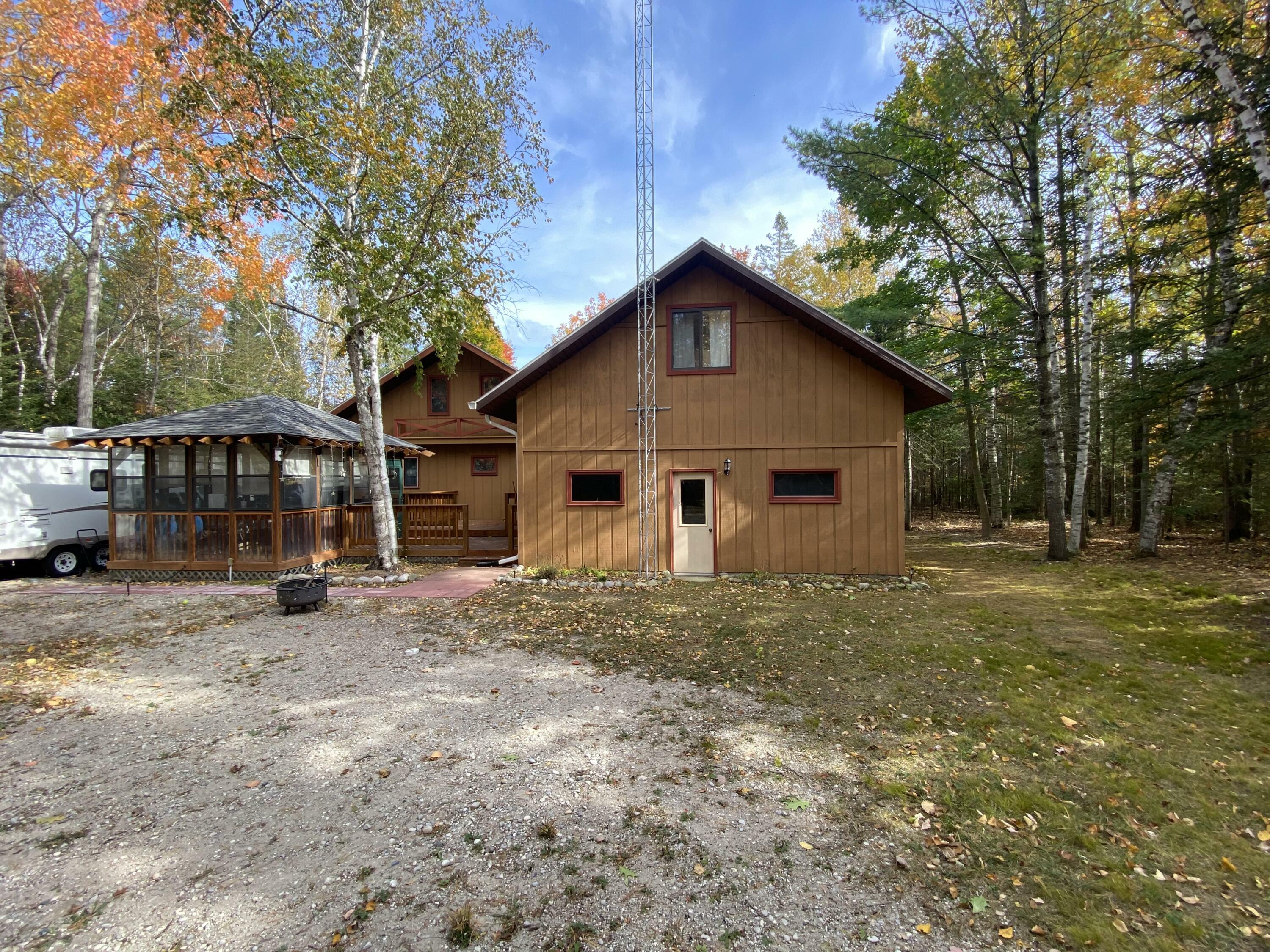 Property Photo:  6350 Whitesand Drive  MI 49777 