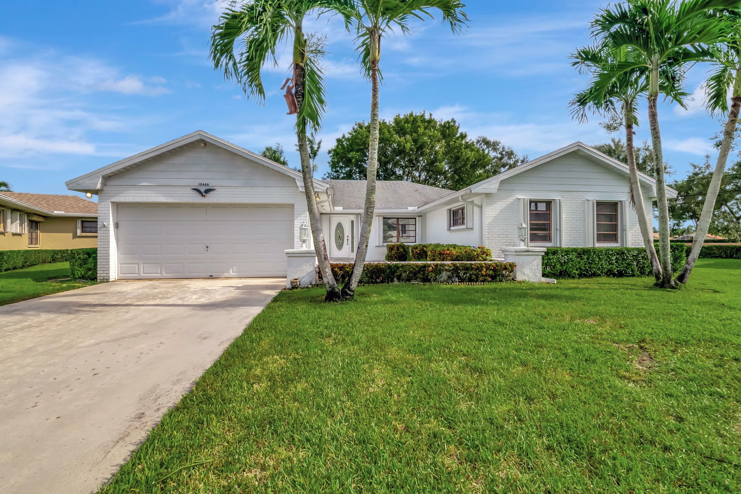 Property Photo:  10666 Greentrail Drive South  FL 33436 