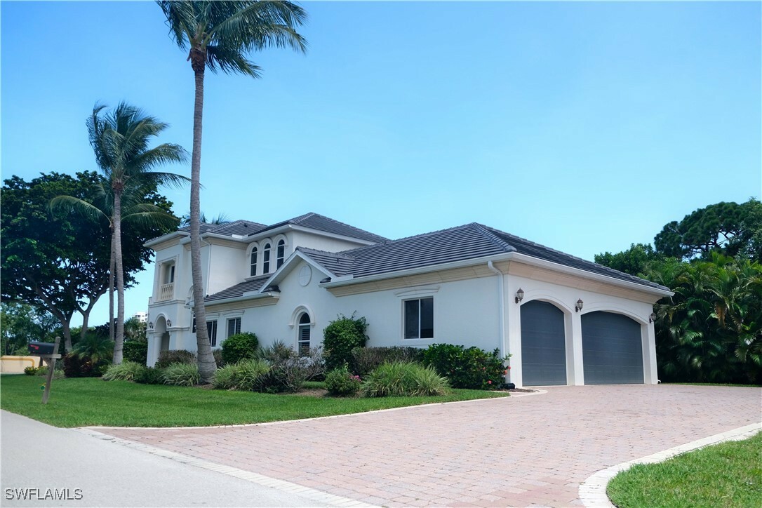 Property Photo: 11002 Vanderbilt Drive FL 34108