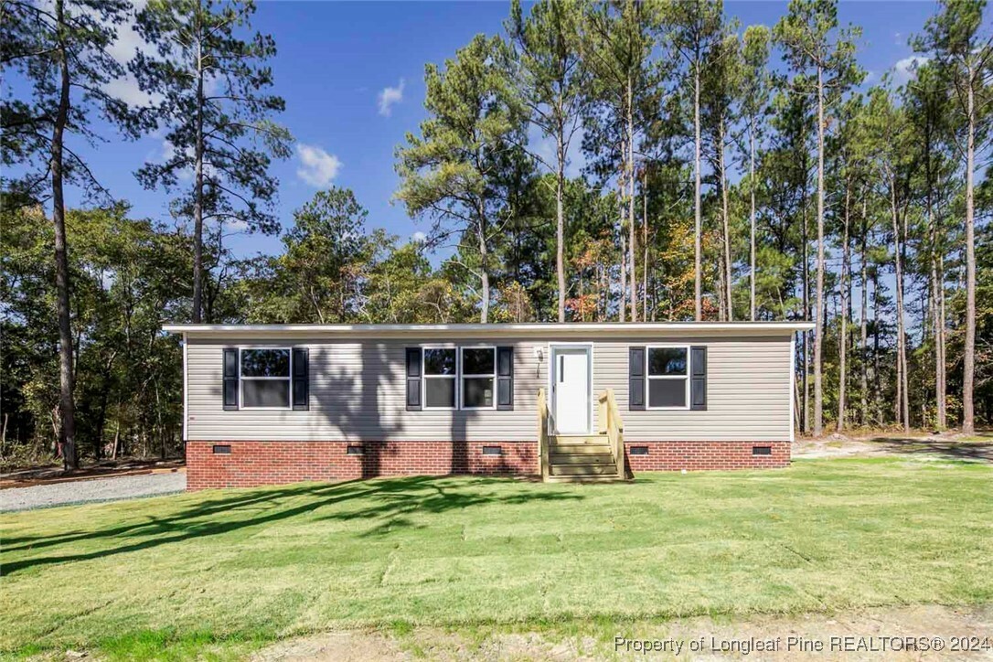 Property Photo:  704 Gilchrist Road  NC 28326 