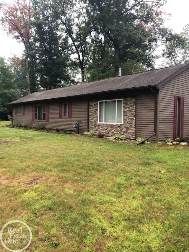 Property Photo:  8431 Kokosing Road  MI 48738 