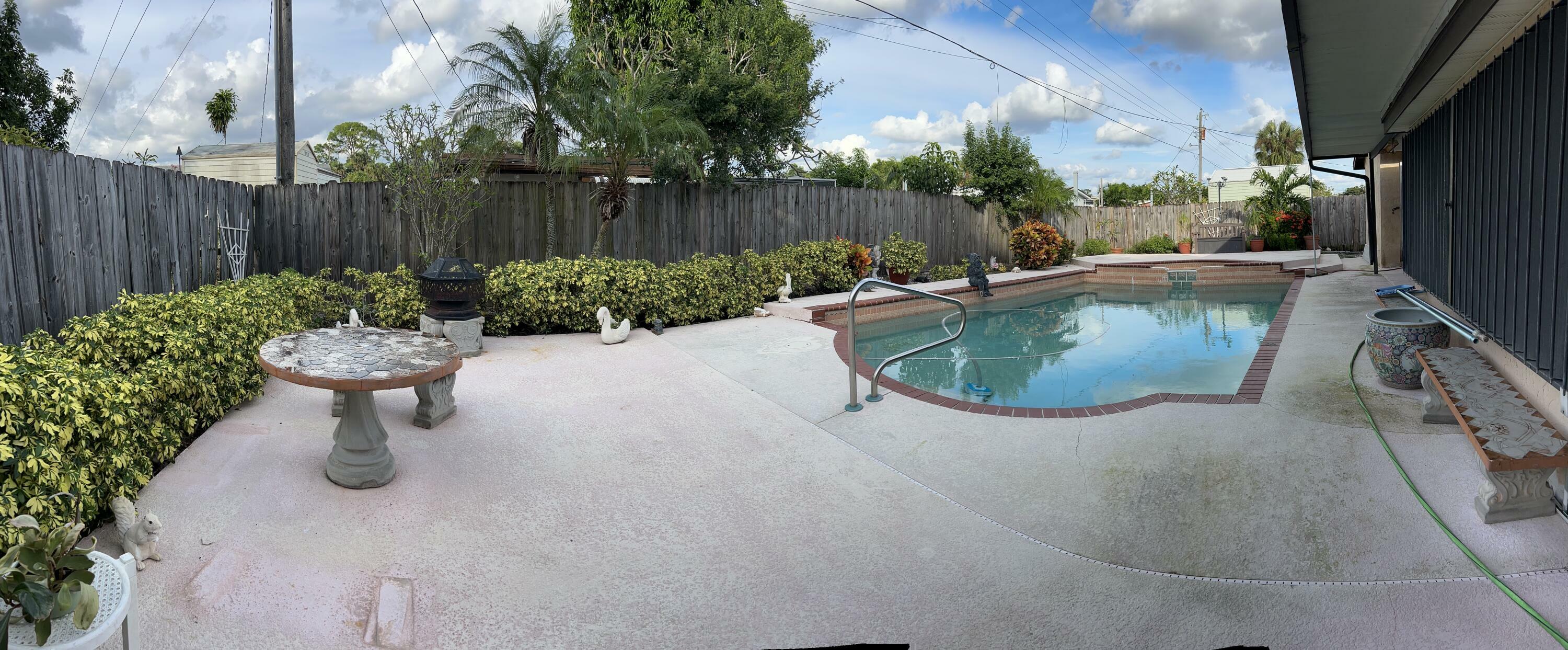 Property Photo:  5871 Purdy Lane  FL 33415 