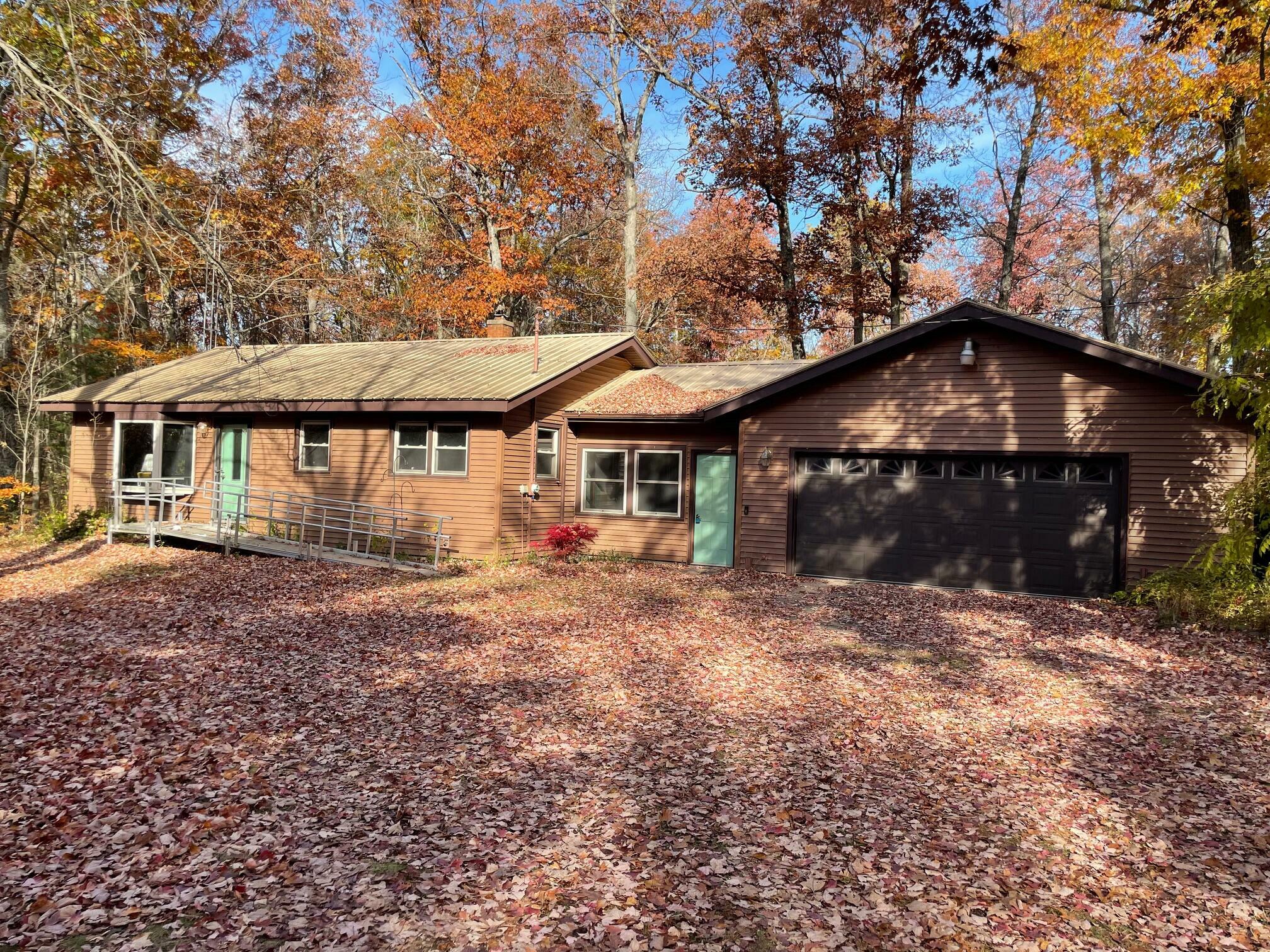 Property Photo:  7468 W 6 1/2 Mile Road  MI 49644 