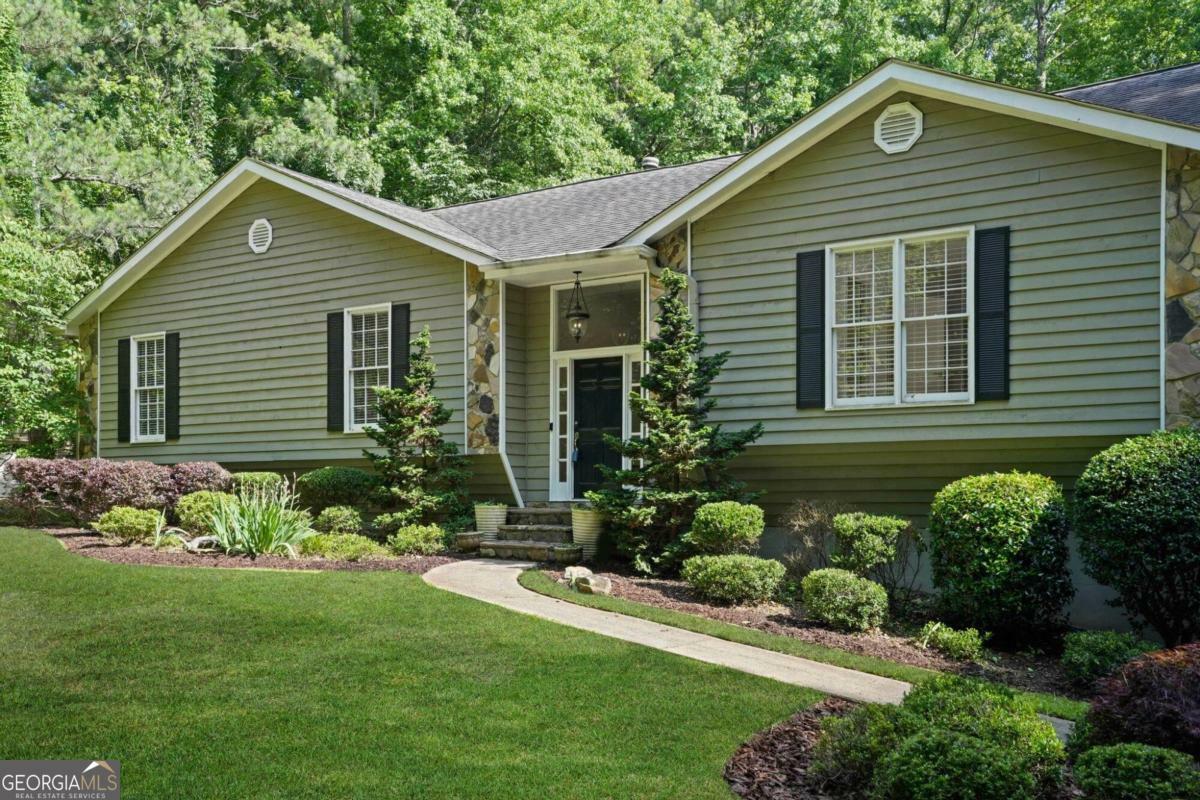 Property Photo:  10500 Haynes Bridge Road  GA 30022 