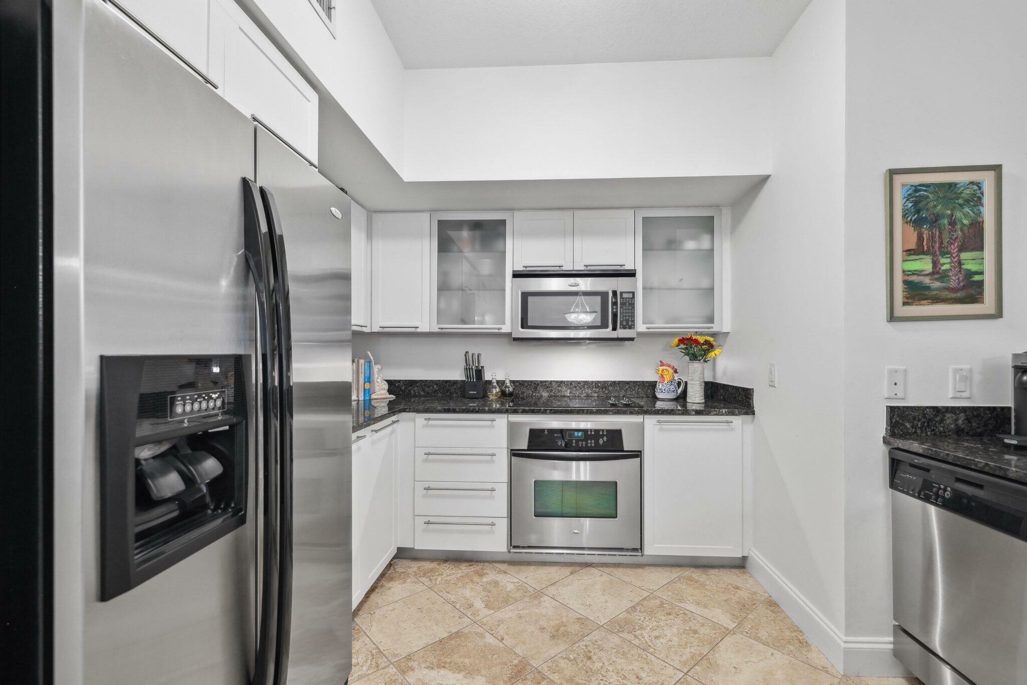 Property Photo:  225 NE 1st Street 204  FL 33444 