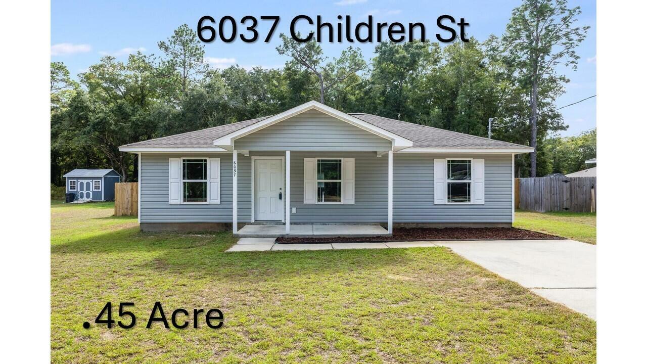 Property Photo:  6037 Children Street  FL 32570 