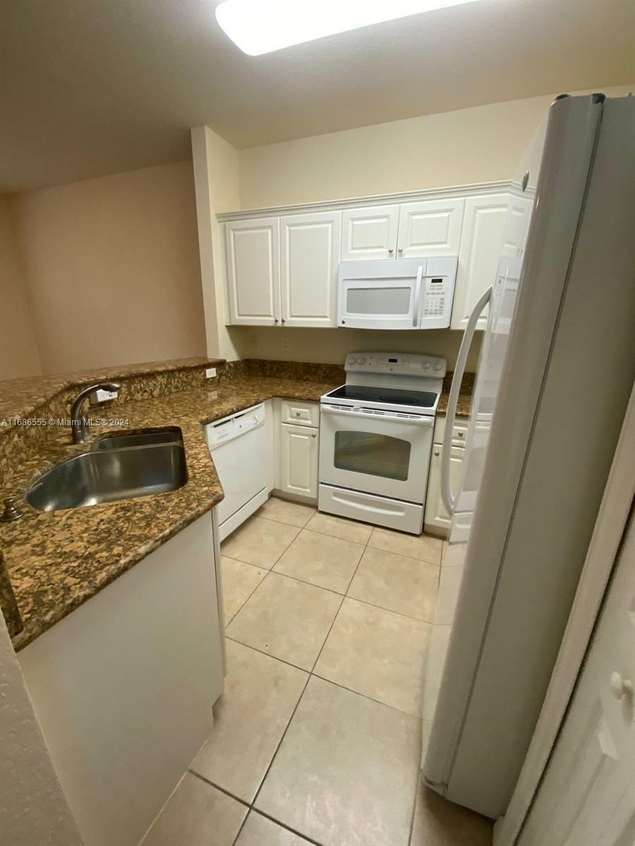 Property Photo:  11886 SW 152nd Pl 11886  FL 33196 