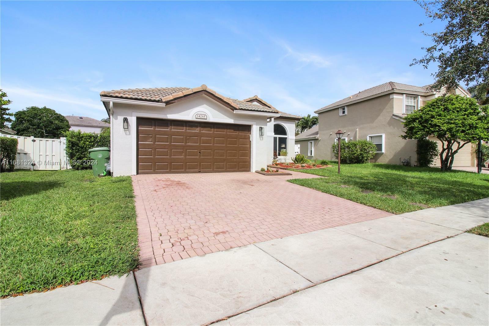 Property Photo:  14265 NW 18th Pl  FL 33028 