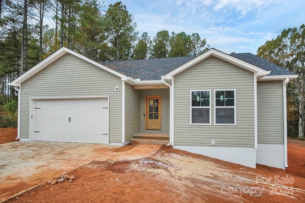 Property Photo:  7066 Sparrow Lane  NC 28168 