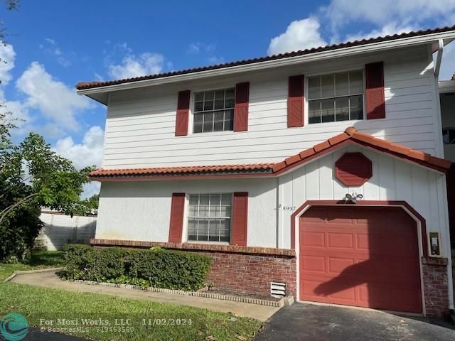 Property Photo:  8957 NW 23rd St 8957  FL 33065 