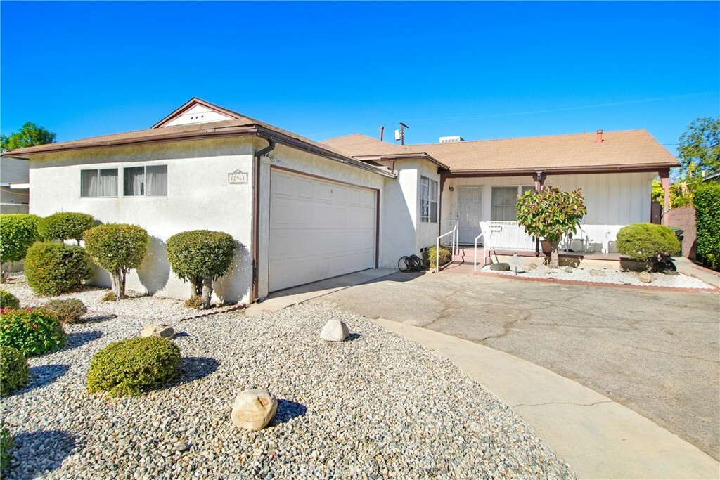 Property Photo:  12961 Filmore Street  CA 91331 