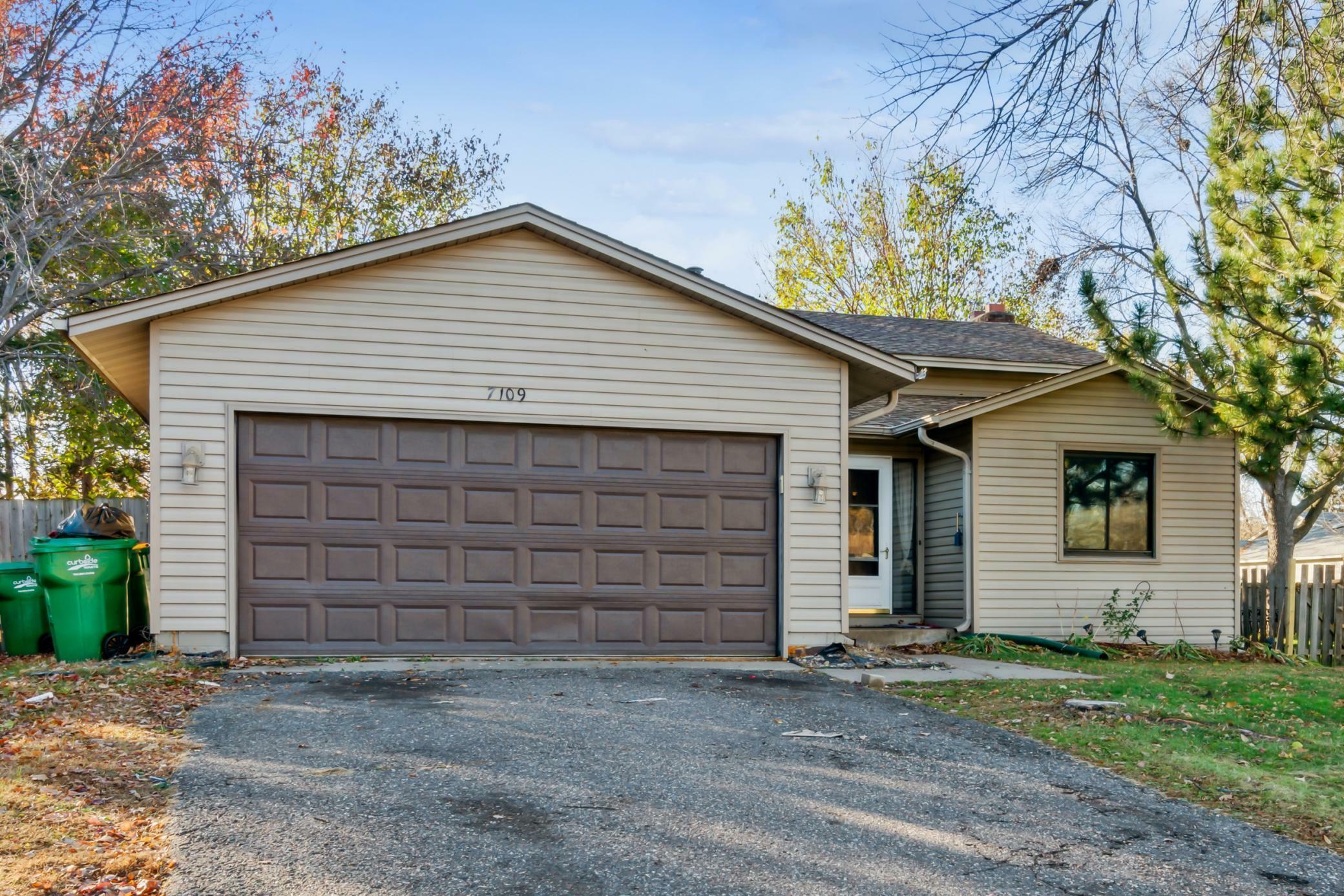 Property Photo:  7109 79th Avenue N  MN 55445 