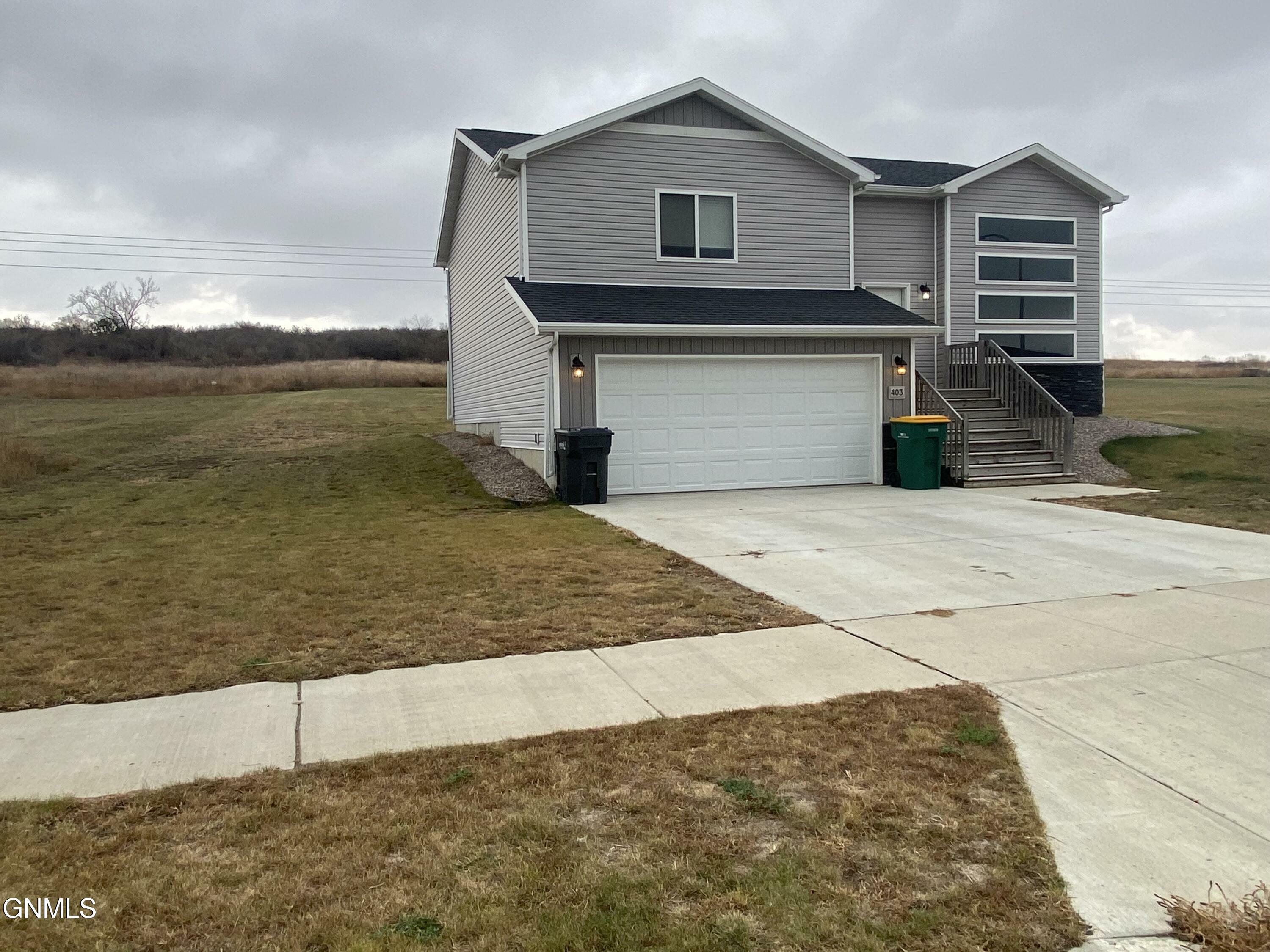 Property Photo:  403 Cobblestone Loop SW  ND 58554 