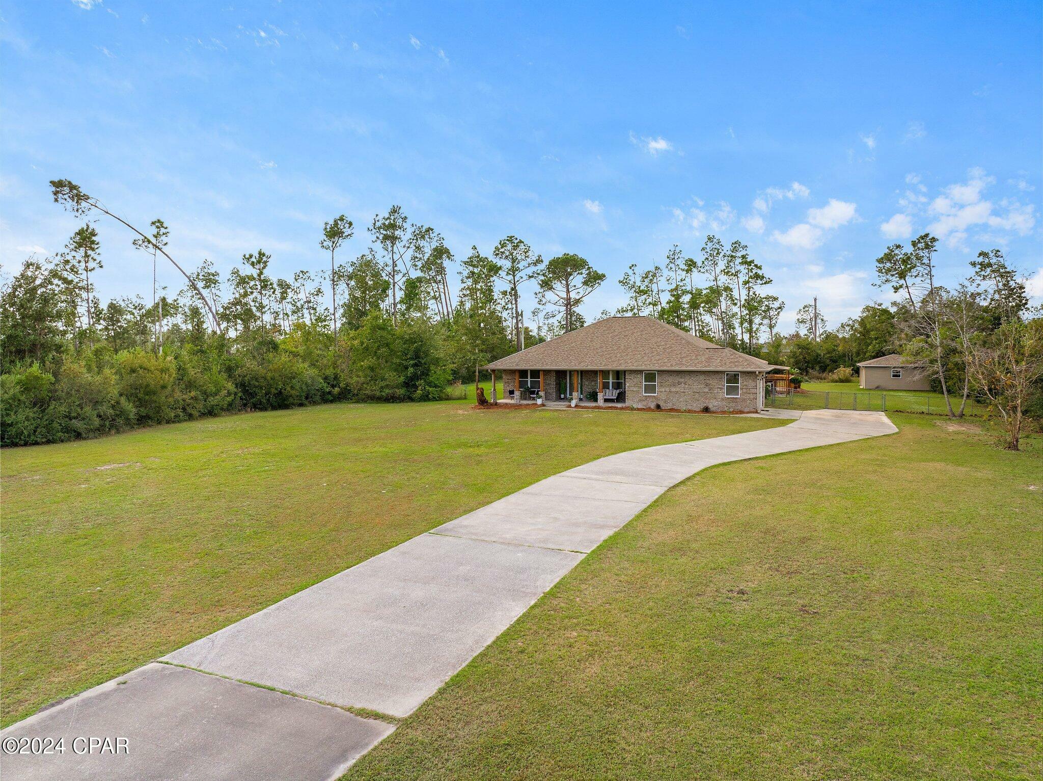 Property Photo:  8113 S McCann Road  FL 32409 