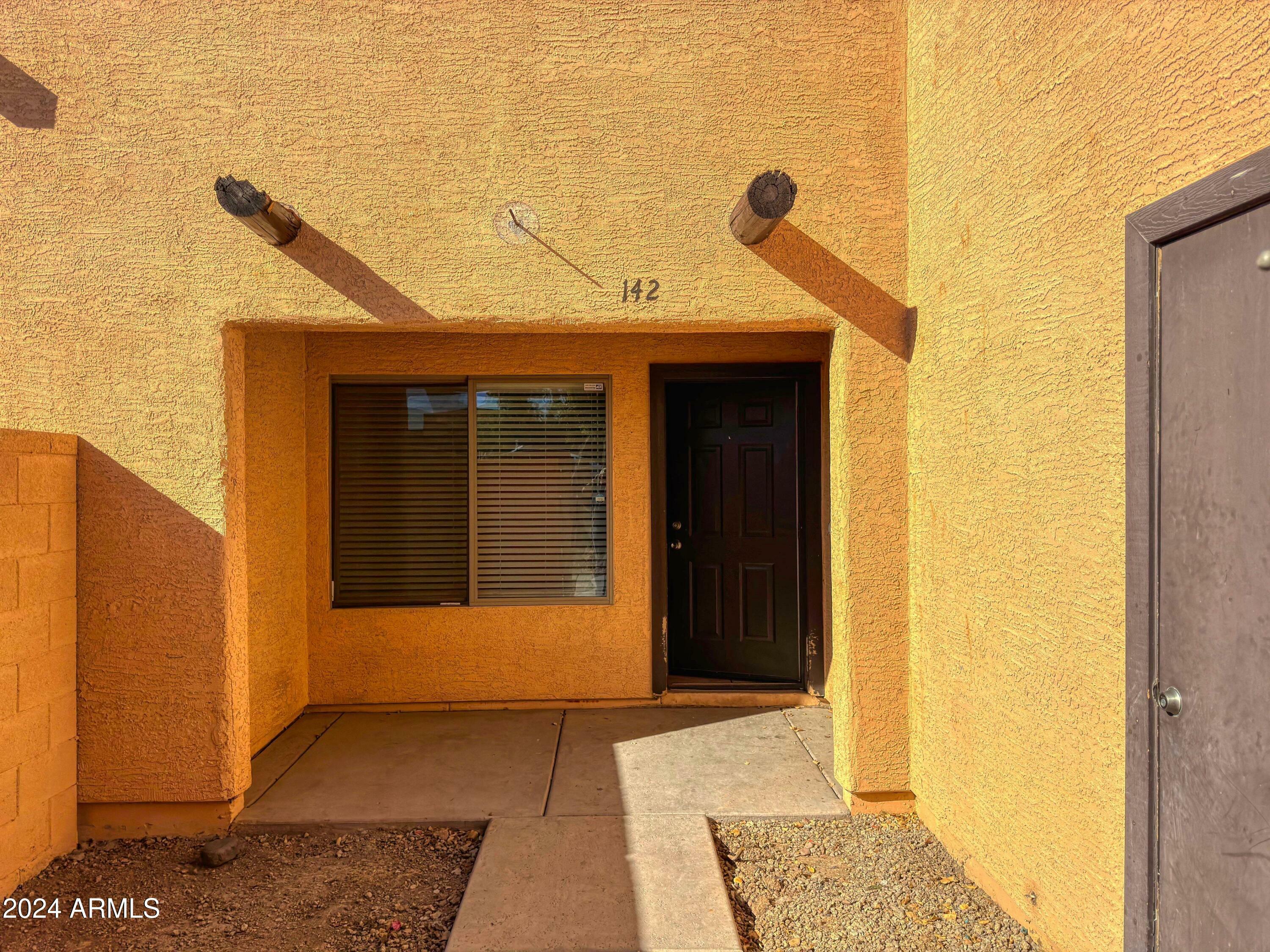 Property Photo:  8940 W Olive Avenue 142  AZ 85345 