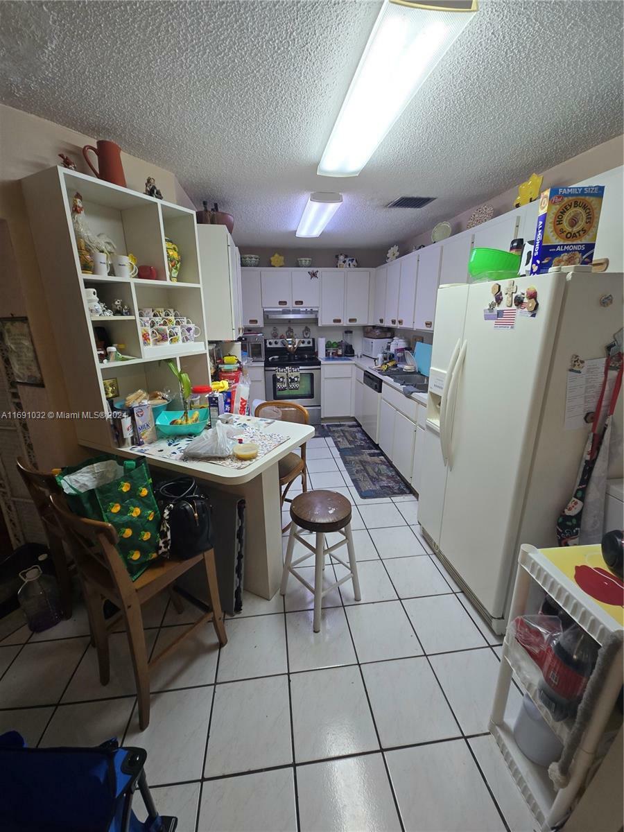 Property Photo:  14756 SW 74th Ln 14756  FL 33193 