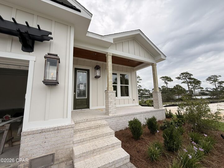Property Photo: 7848 Grand Lagoon Way FL 32408